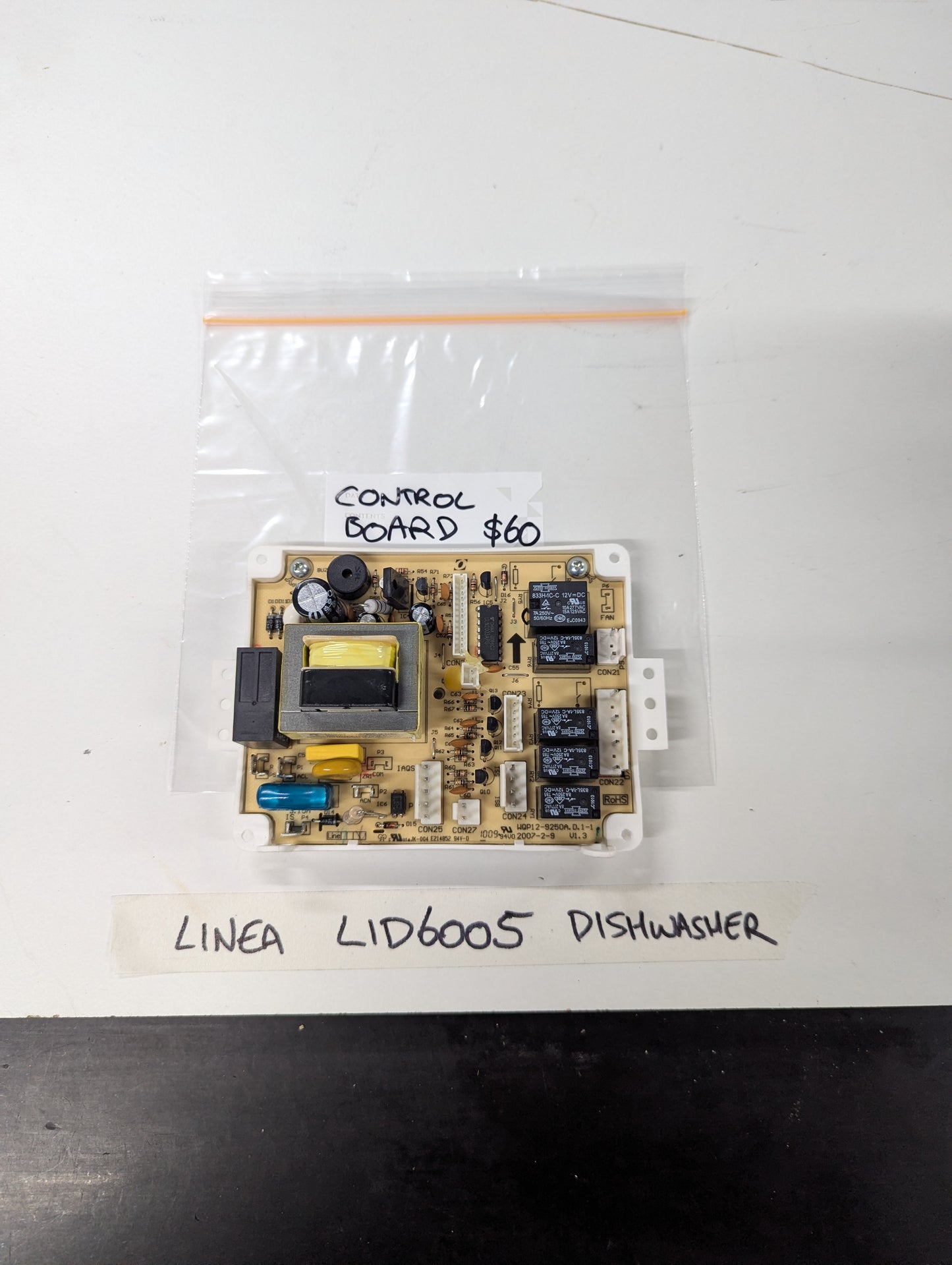 Linea LID6005 dishwasher control board on white table