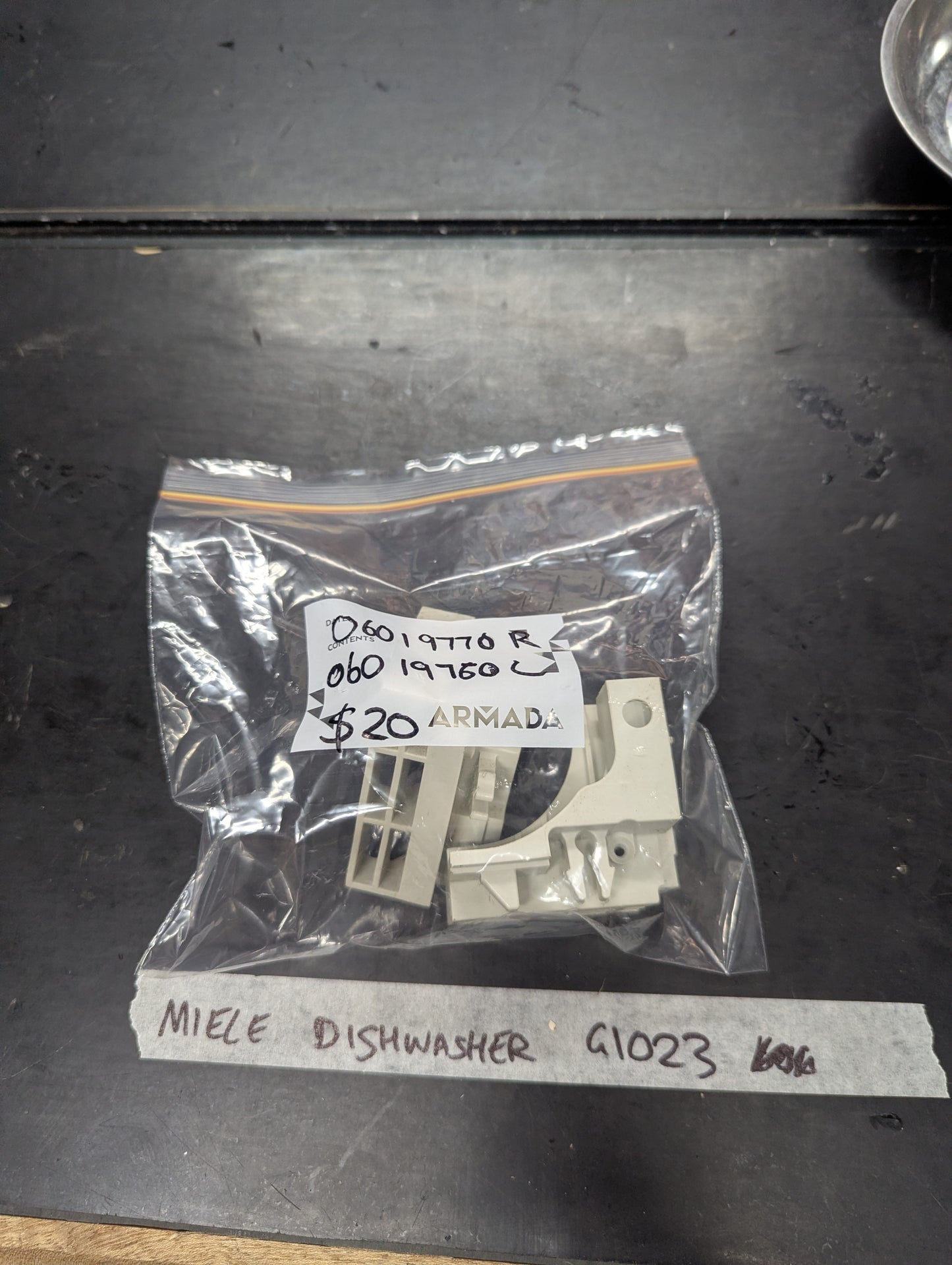 Miele dishwasher G1023 replacement part in clear plastic bag