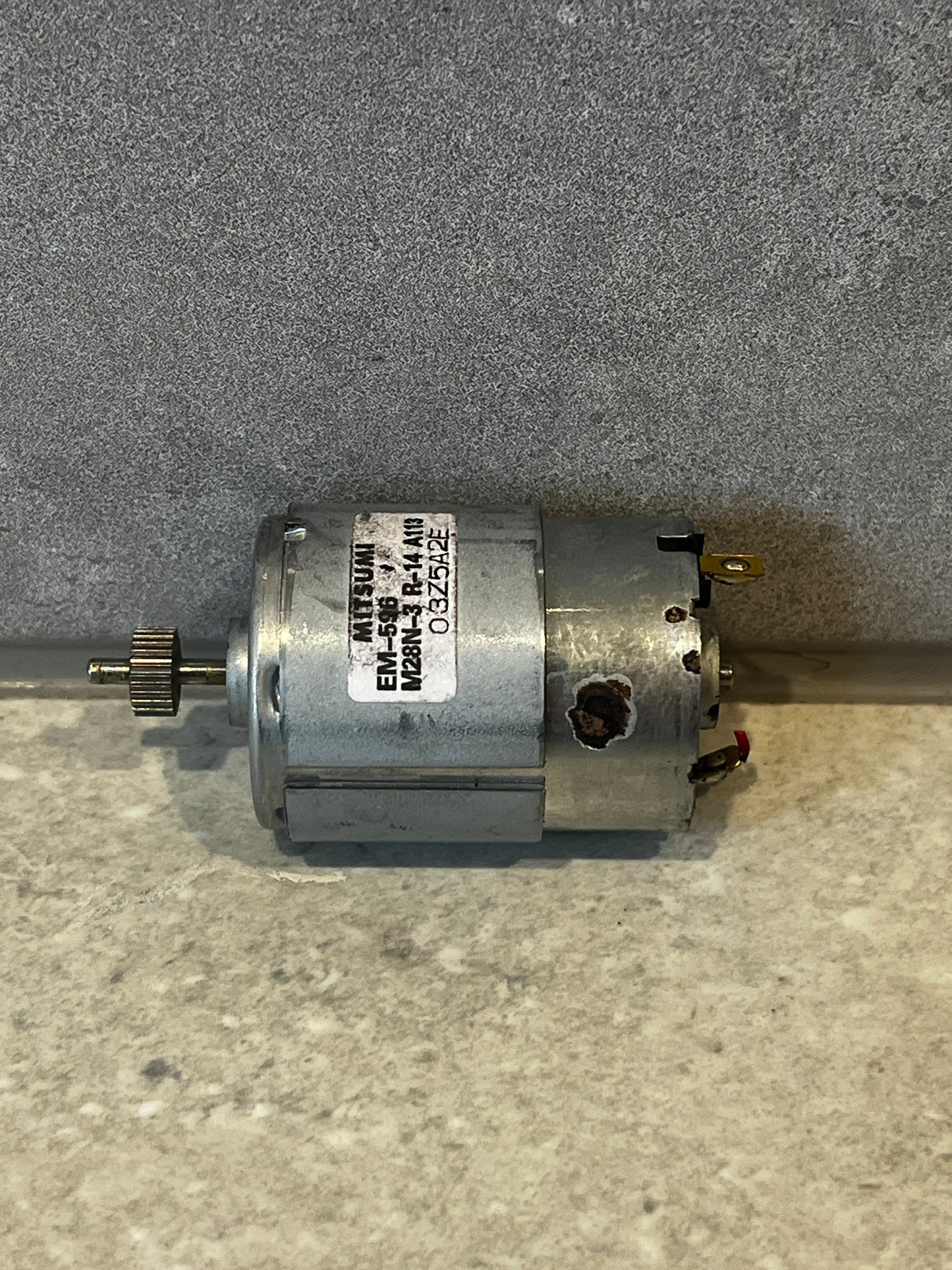 Mitsumi EM-536 DC motor with metal case and gear shaft