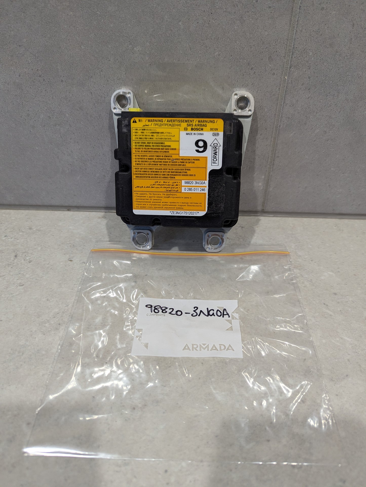Bosch SRS airbag control module with yellow warning label and part number 98820-3NA0A