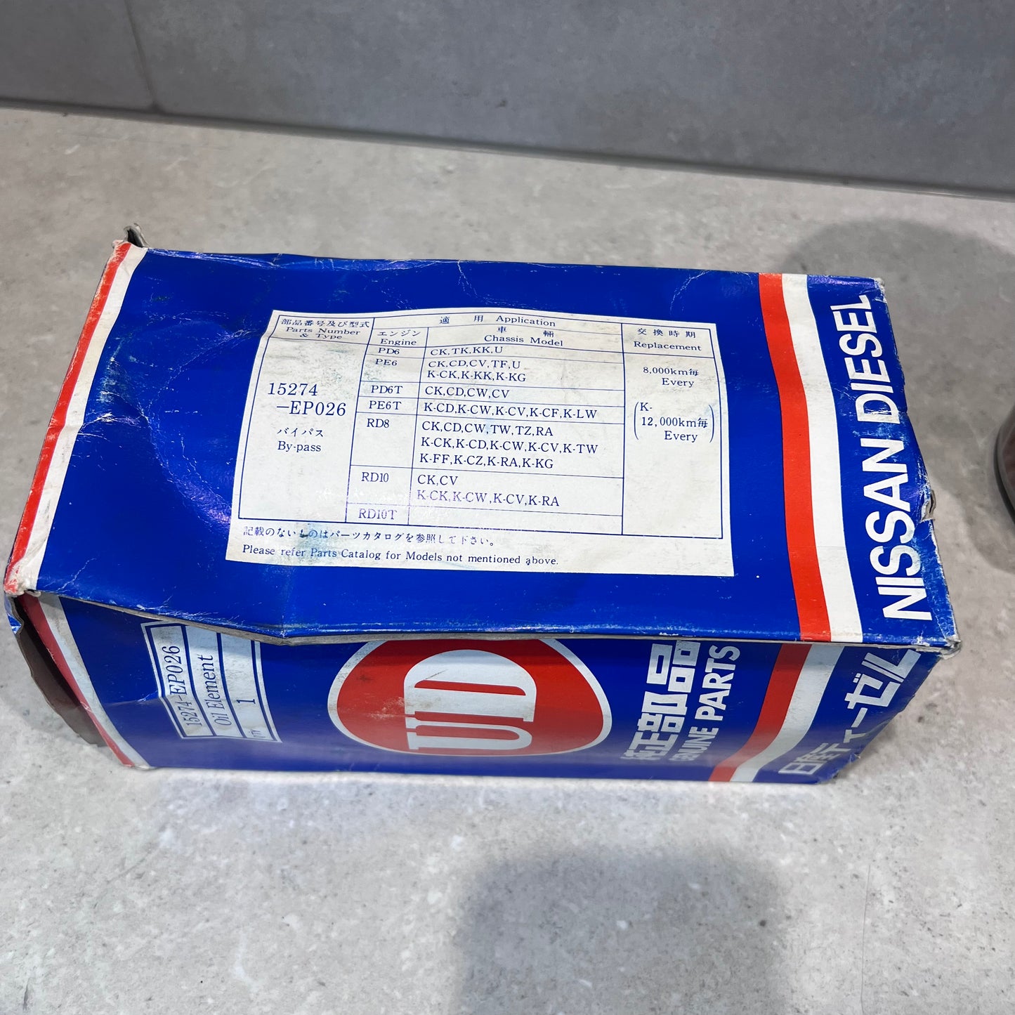 UD Nissan Diesel oil filter box with part details and instructions