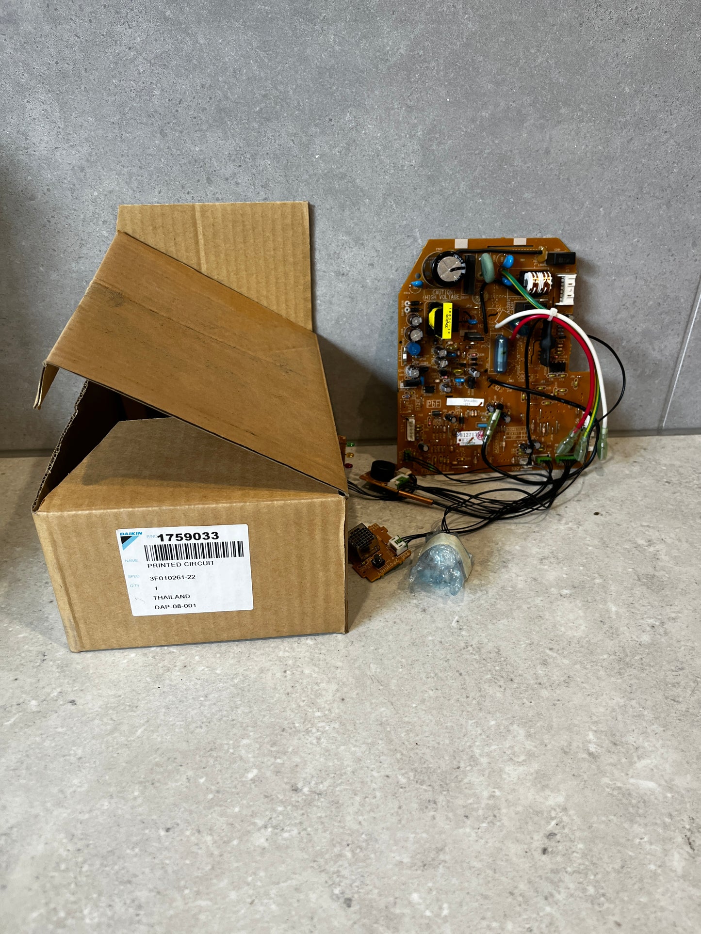 Daikin printed circuit board kit with original packaging and box