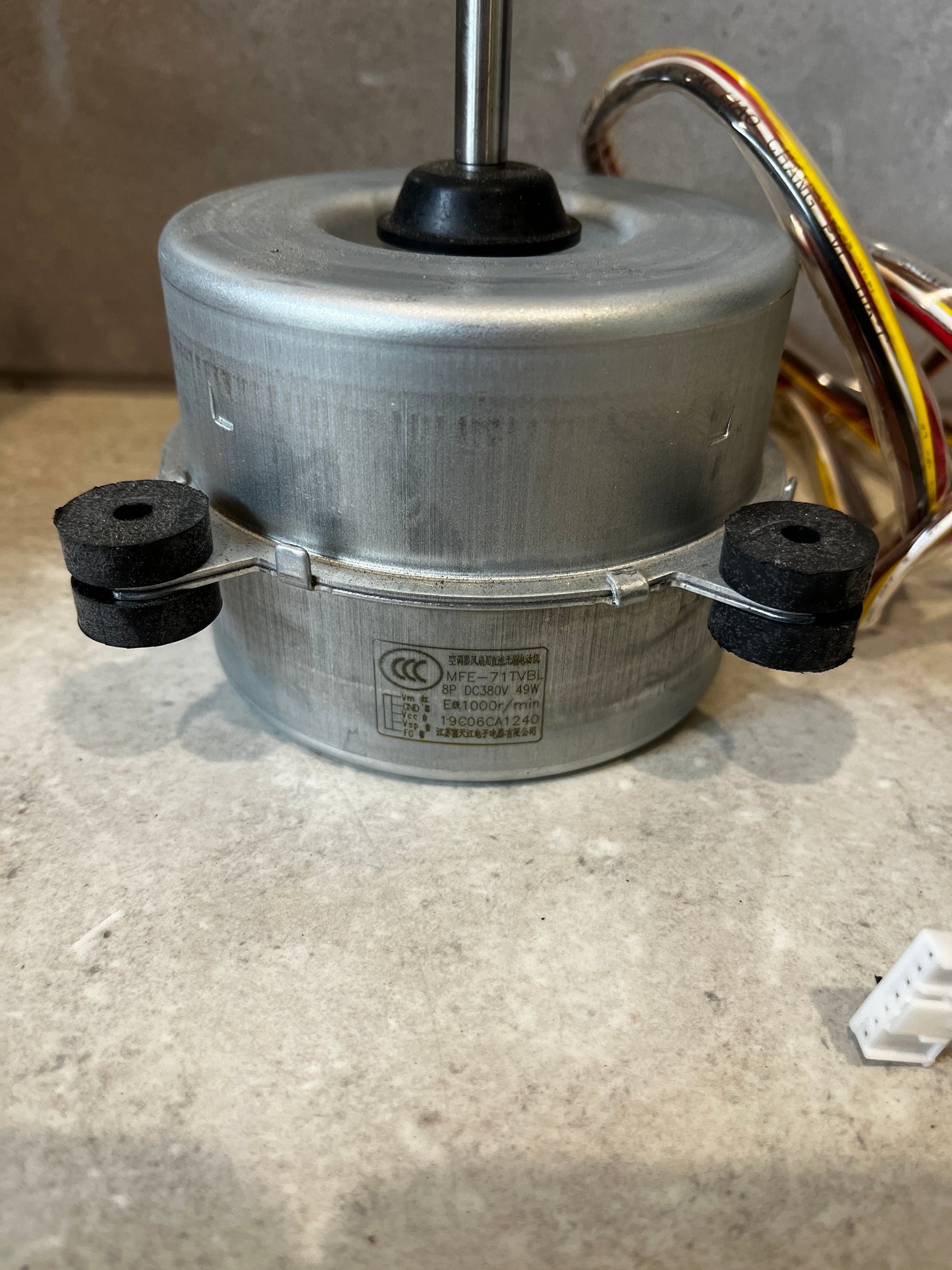 Close-up of Fujitsu brushless DC motor wiring and label