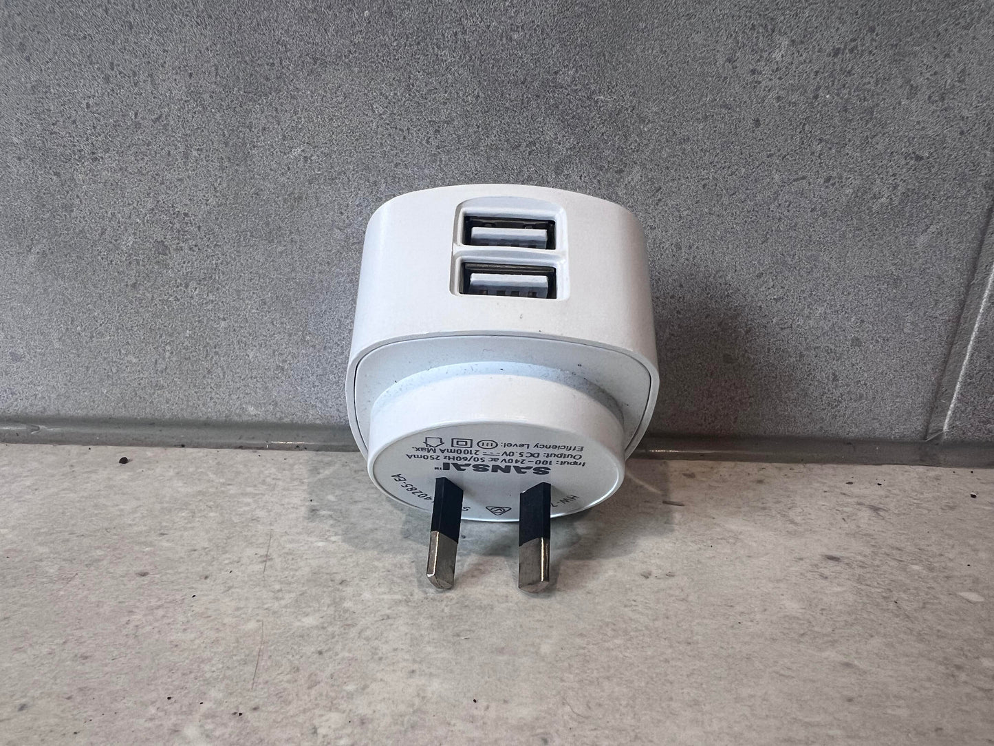 Side view of Sansai wall charger showing two USB ports