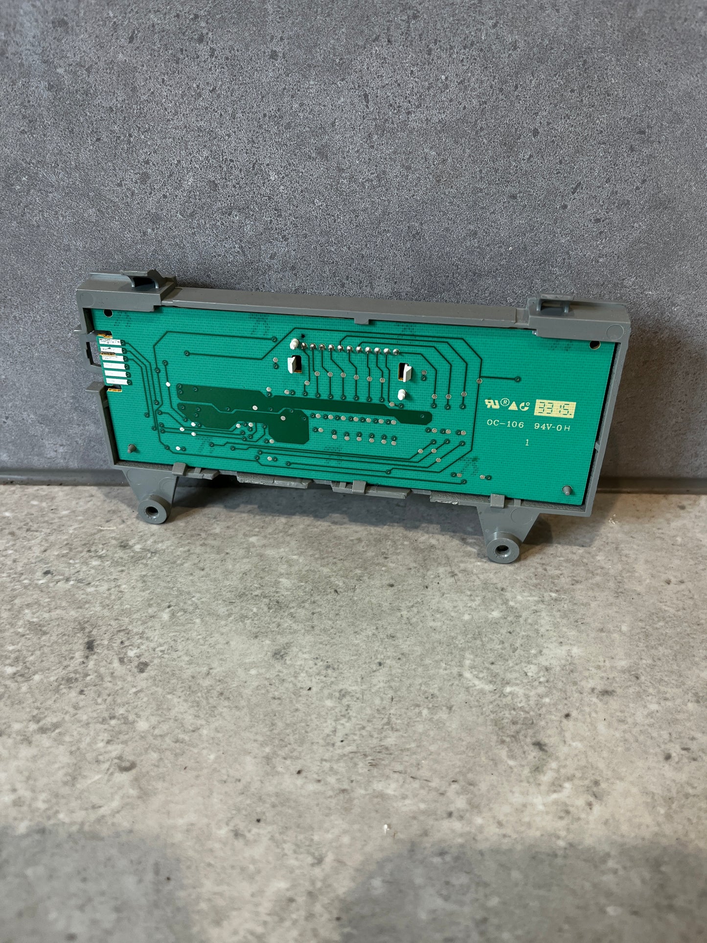 Rear view of digital oven control board showing circuitry
