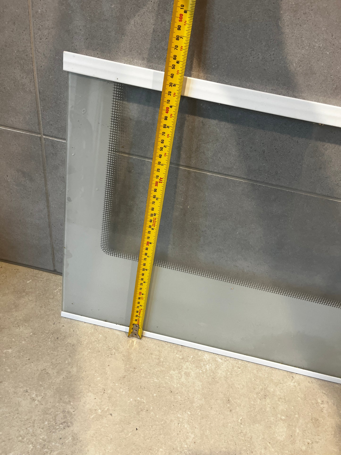 Fridge Glass panel with measuring tape showing height dimensions