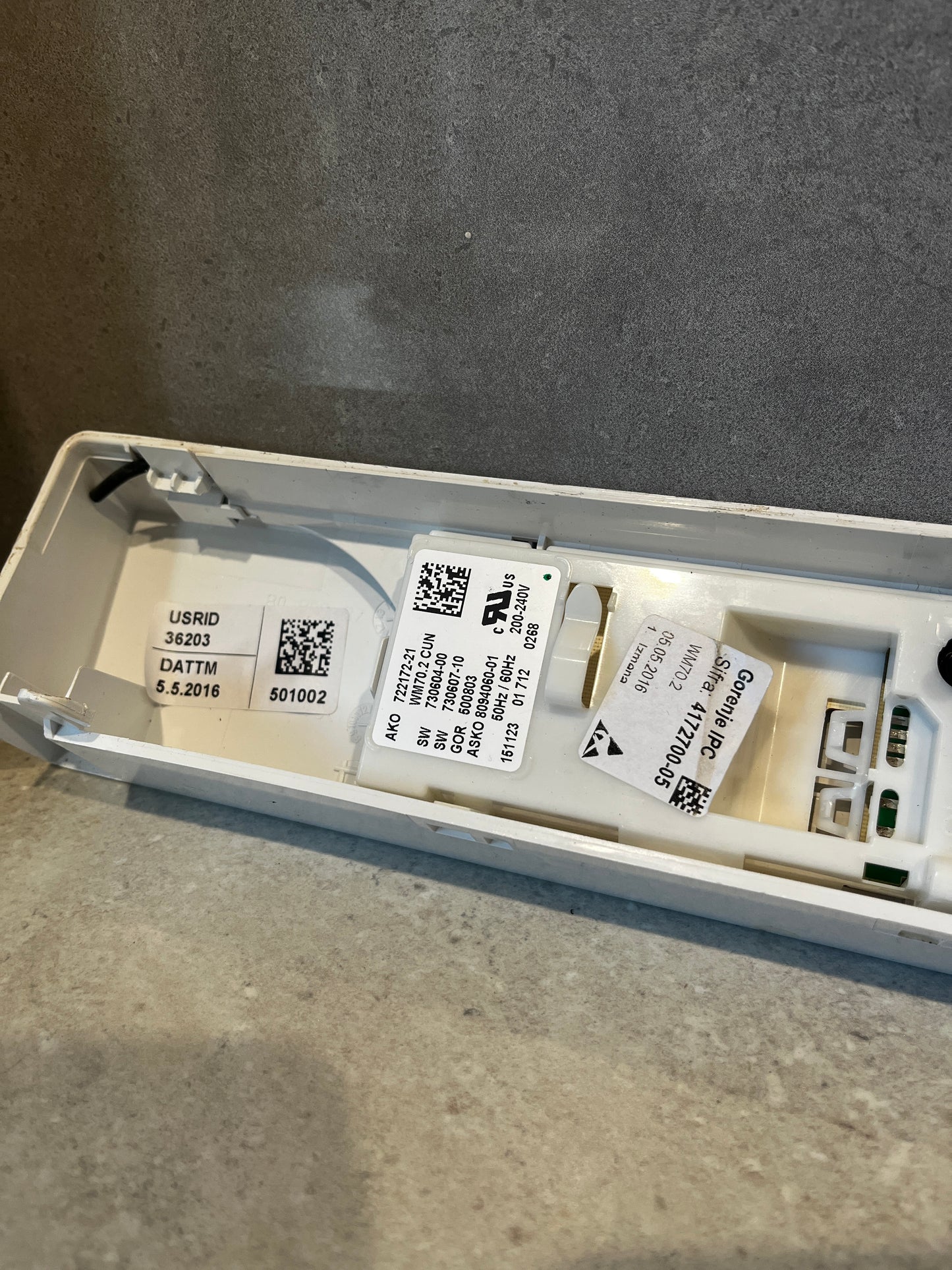 ASKO washing machine control panel internal label close-up