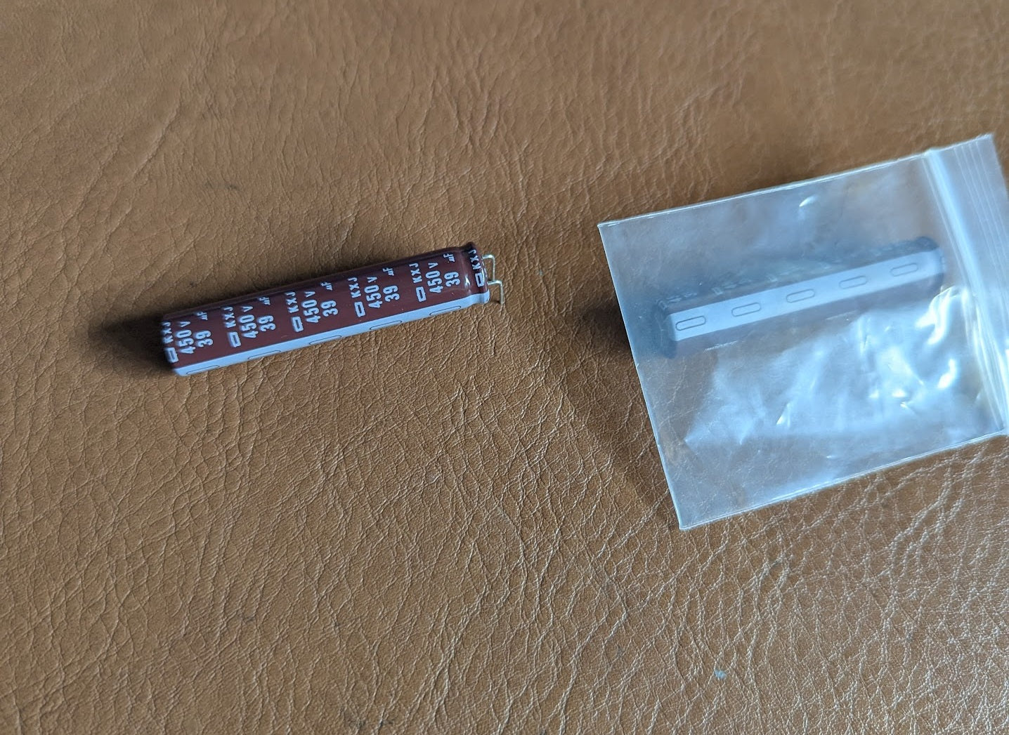 Chemi-Con EKXJ451ELL390MJ50S 39uF 450V 10Dx50H Electrolytic Capacitor