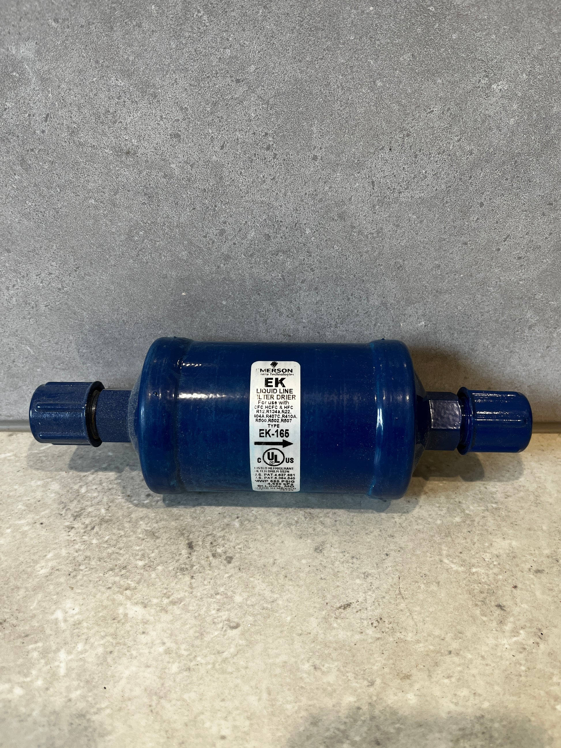 Emerson EK-166 Liquid Line Filter Drier cylindrical blue metal component