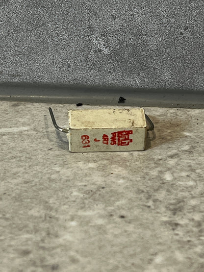 Rectangular wirewound ceramic power resistor with red printed specifications and wire leads