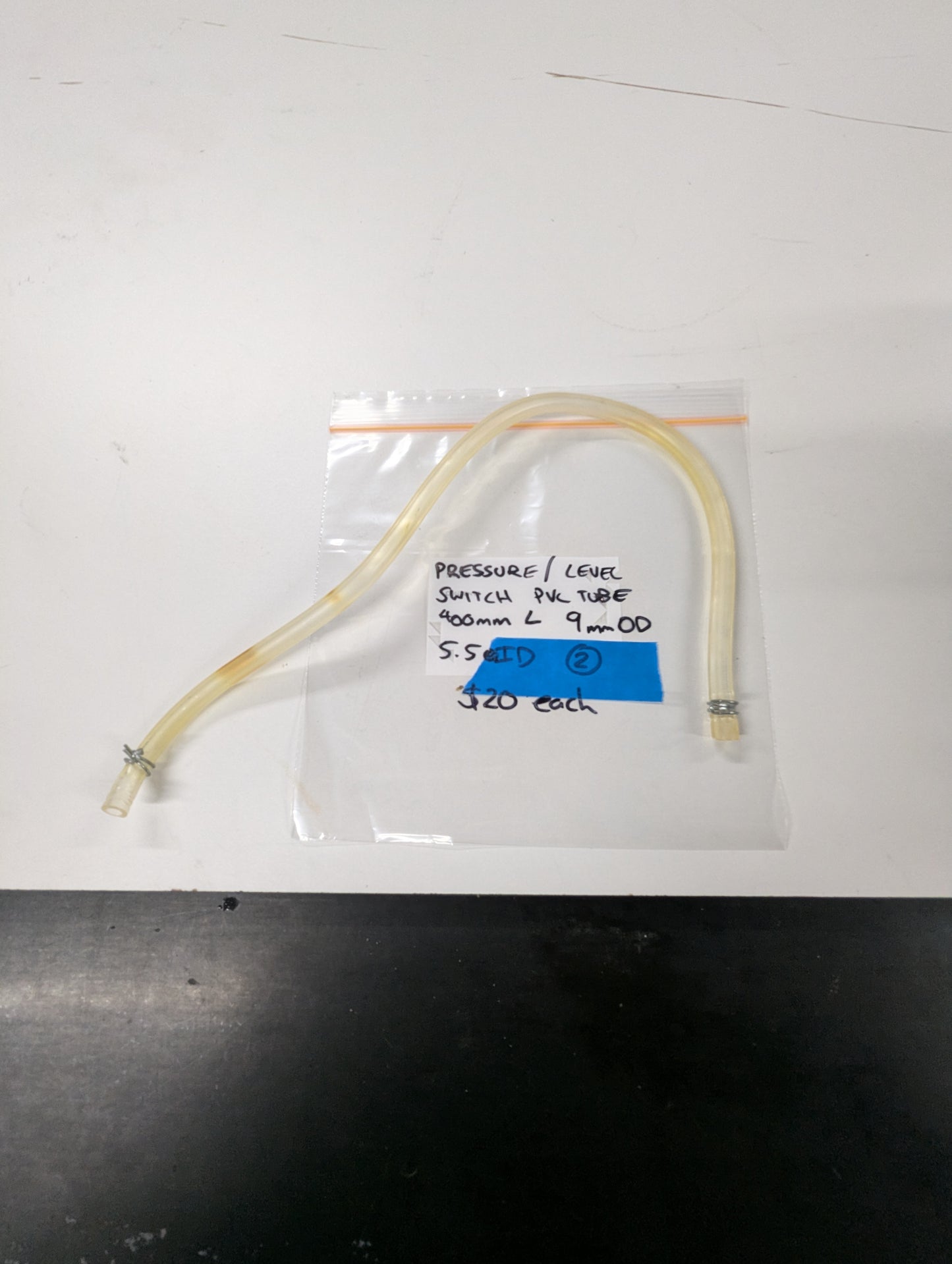 Clear PVC pressure switch tube with clamps, labeled bag