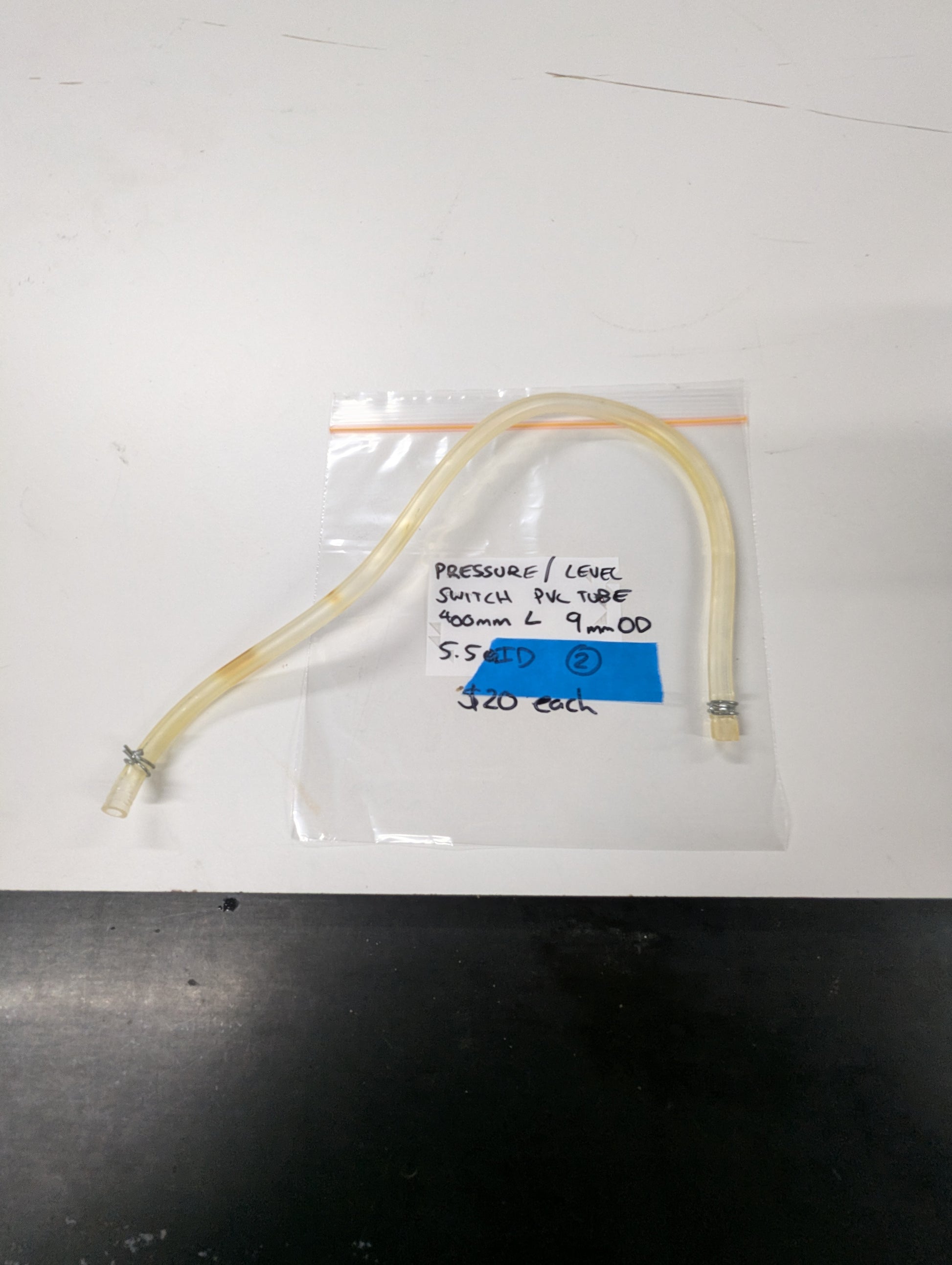 Clear PVC pressure switch tube with clamps, labeled bag