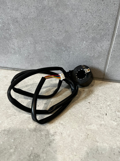Fujikoki 12V electronic solenoid valve with wiring on gray surface