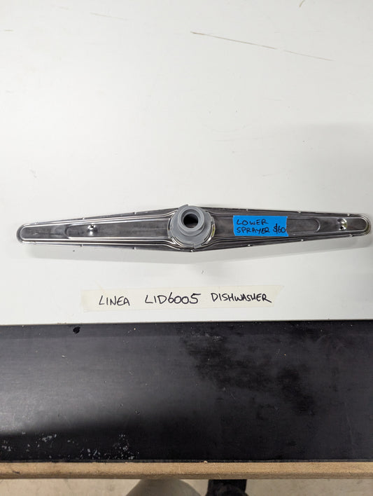 Linea LID6005 dishwasher lower sprayer arm on white table