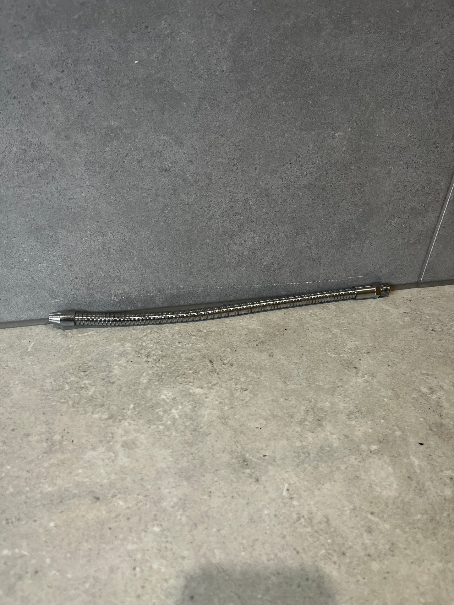 Flexible stainless steel hose connector for plumbing applications