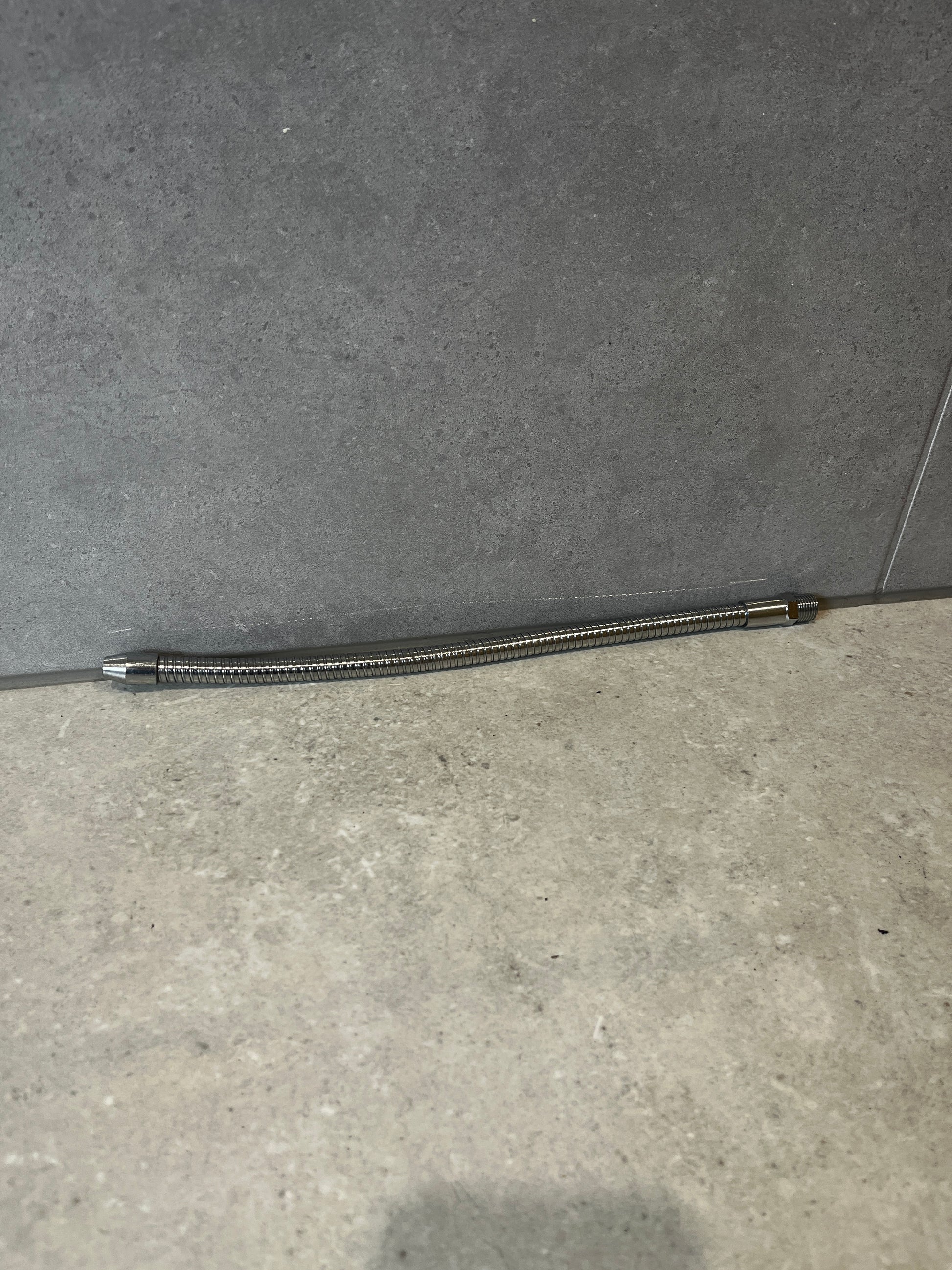 Flexible stainless steel hose connector for plumbing applications