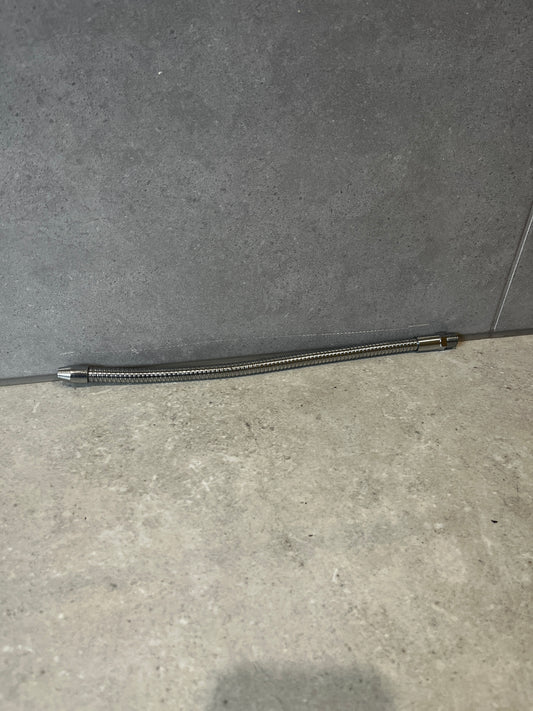 Flexible stainless steel hose connector for plumbing applications