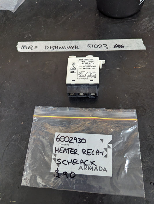 Schrack heater relay for Miele dishwasher with labeled bag on workbench