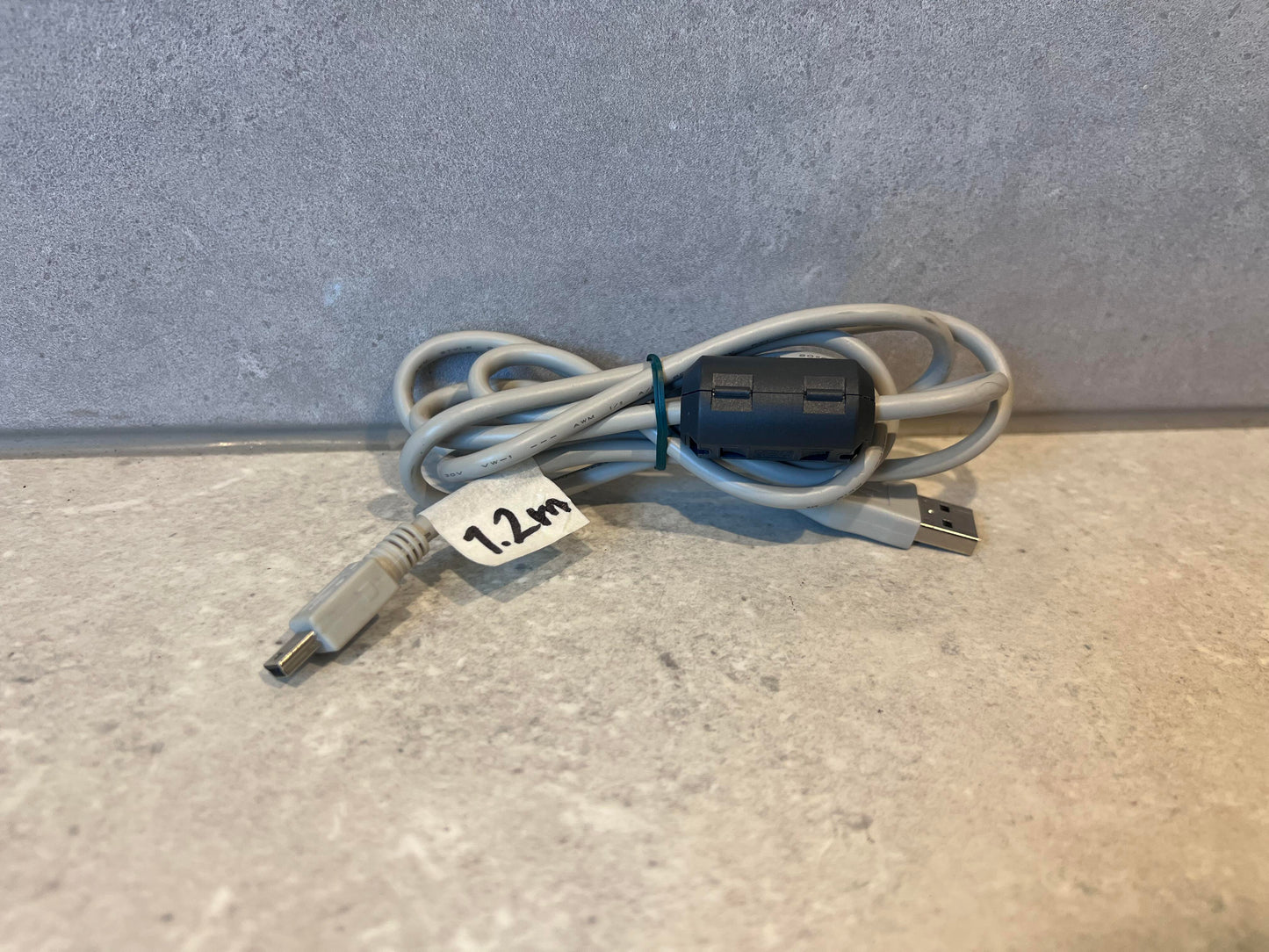 Coiled 1.2 meter USB-A to Mini USB cable with ferrite core