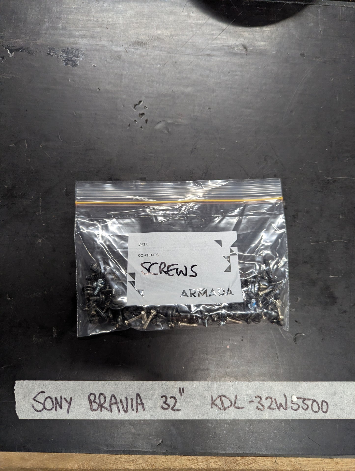 Bag of assorted screws labeled for Sony Bravia 32-inch KDL-32W5500 TV