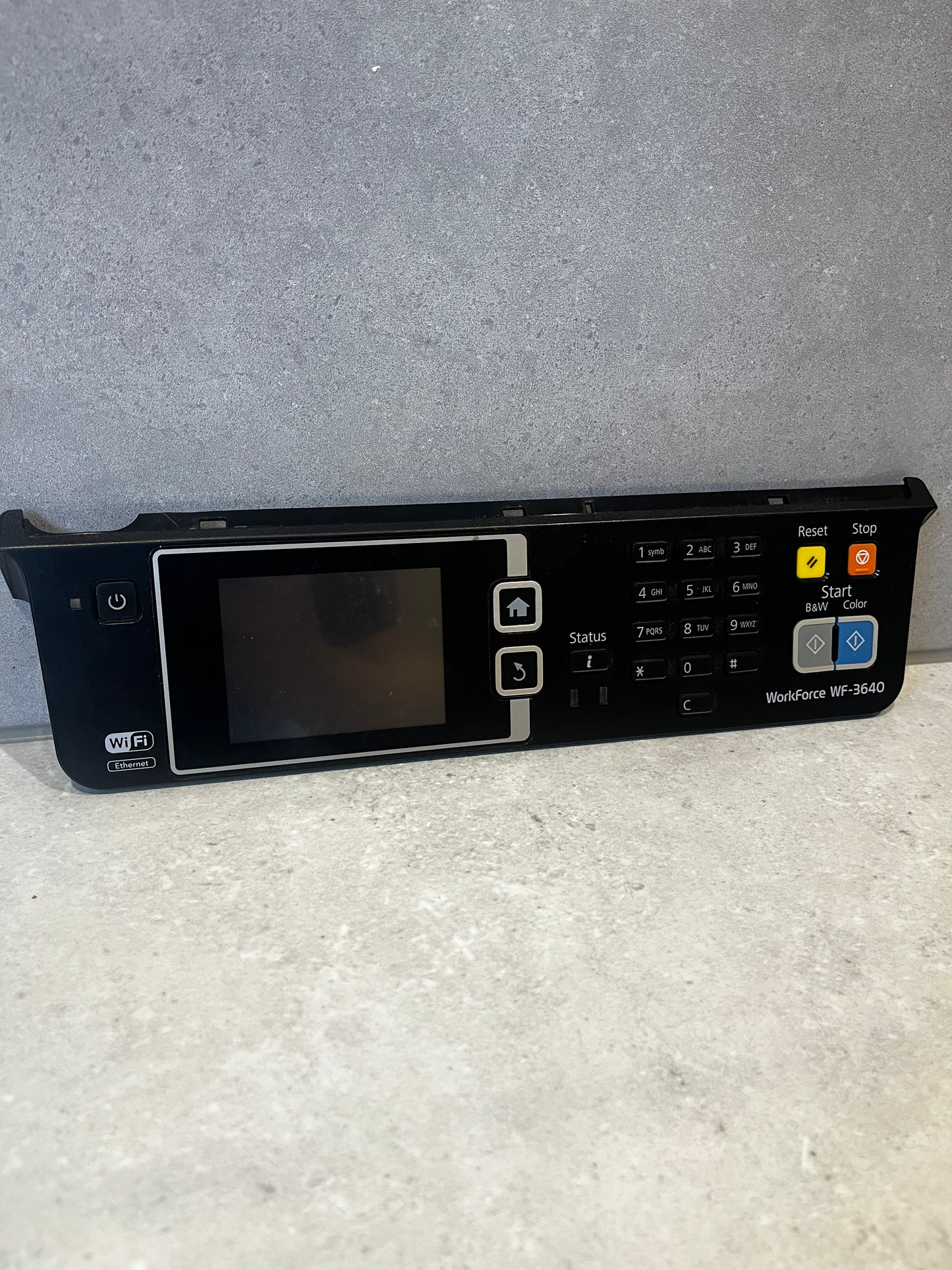 Front view of Epson WorkForce WF-3640 control panel with LCD screen, keypad, and buttons