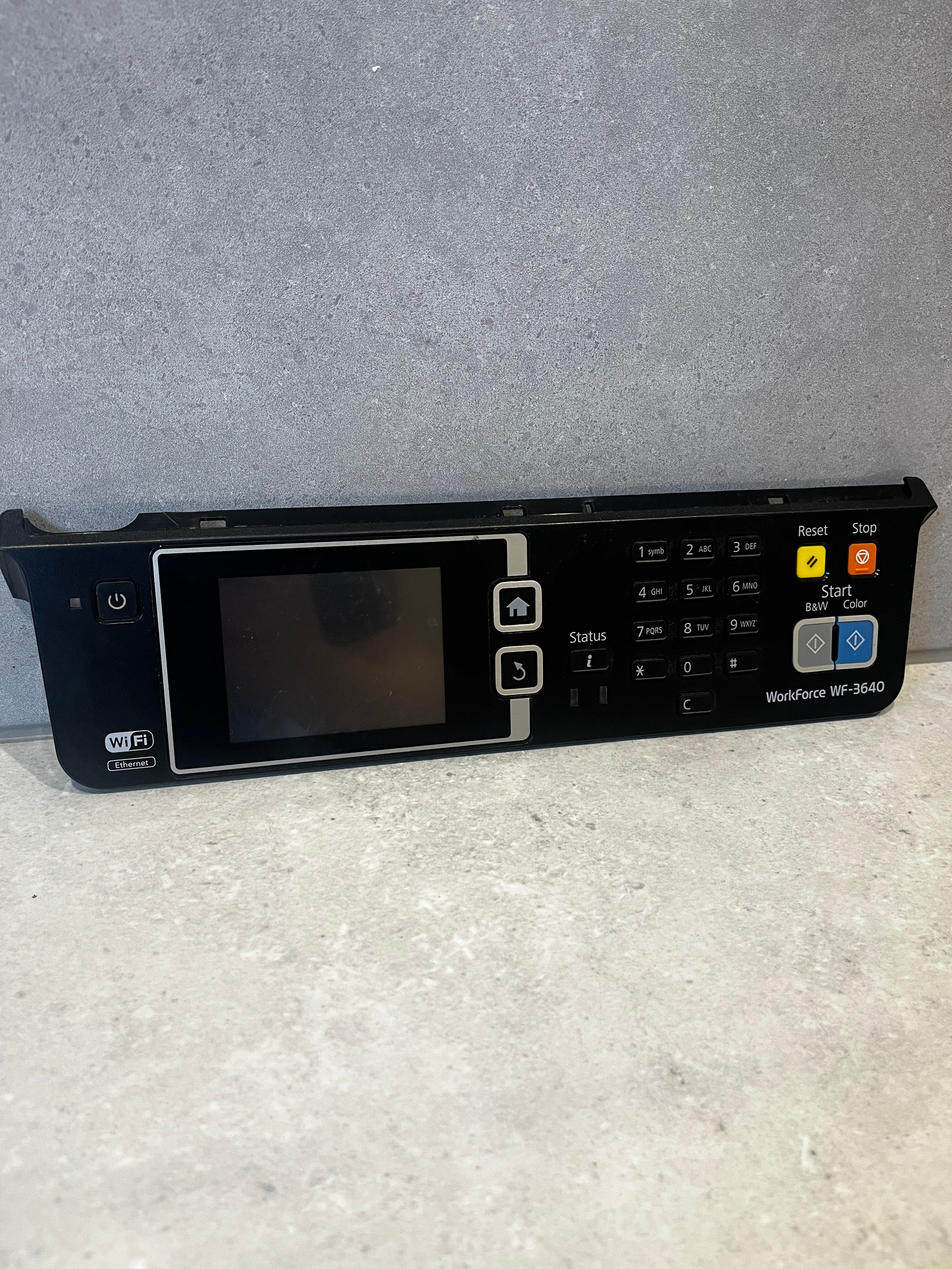 Front view of Epson WorkForce WF-3640 control panel with LCD screen, keypad, and buttons