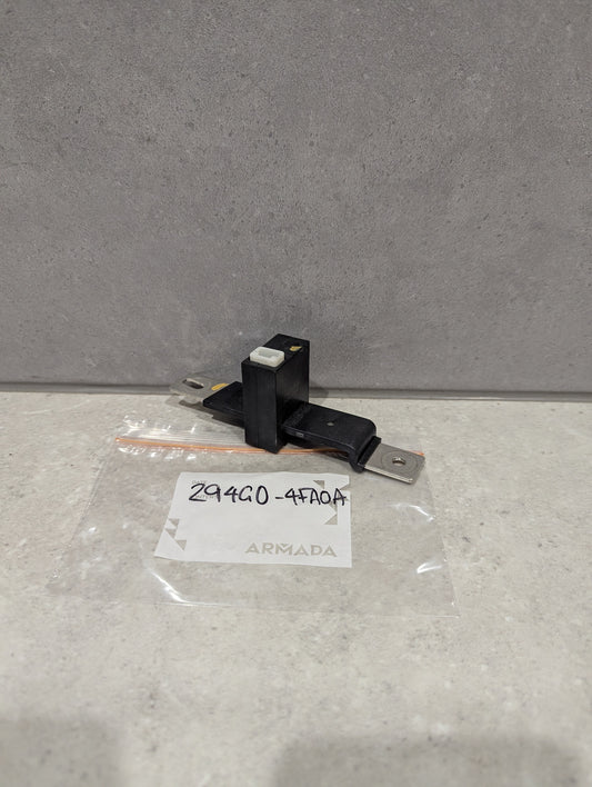 Armada electrical contact brush assembly with metal terminals on a countertop