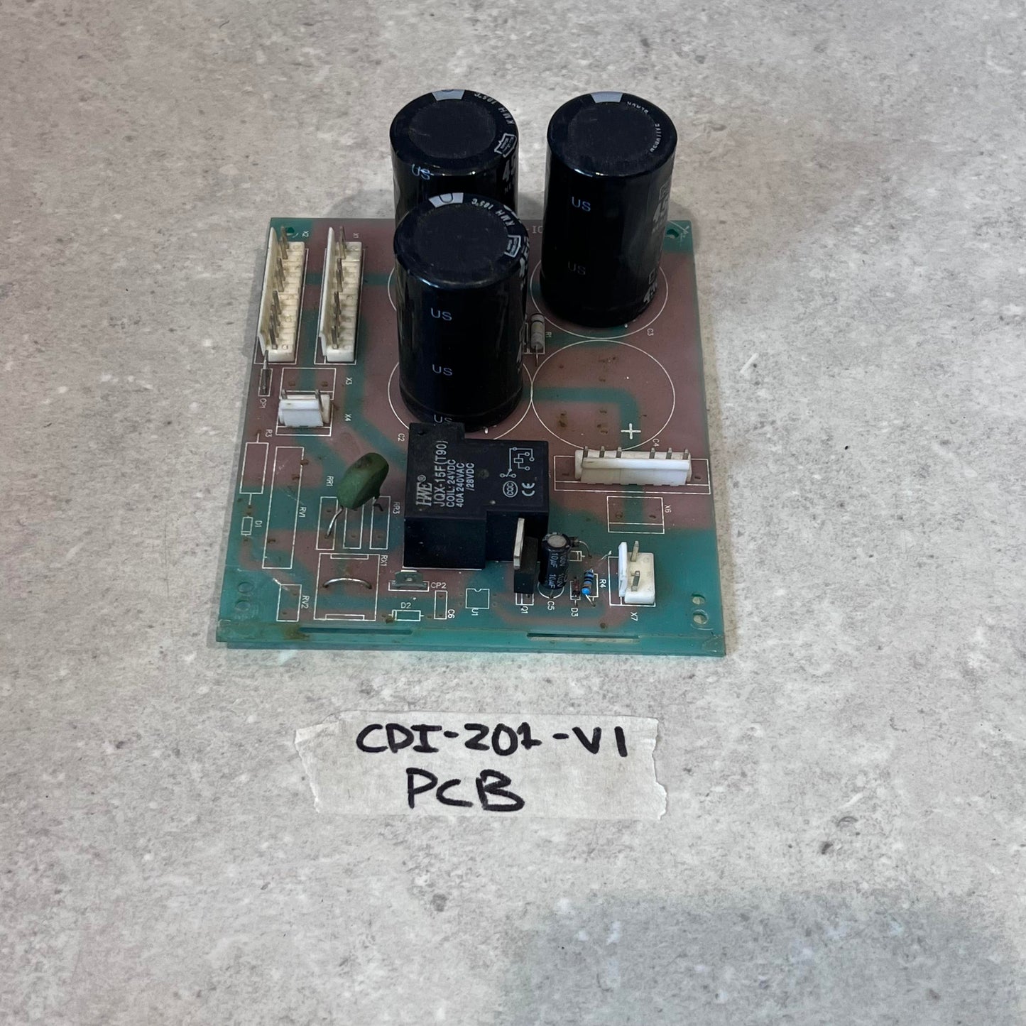 CDI-201-V1 PCB circuit board for CUT50 plasma cutter with capacitors and relays on a gray background