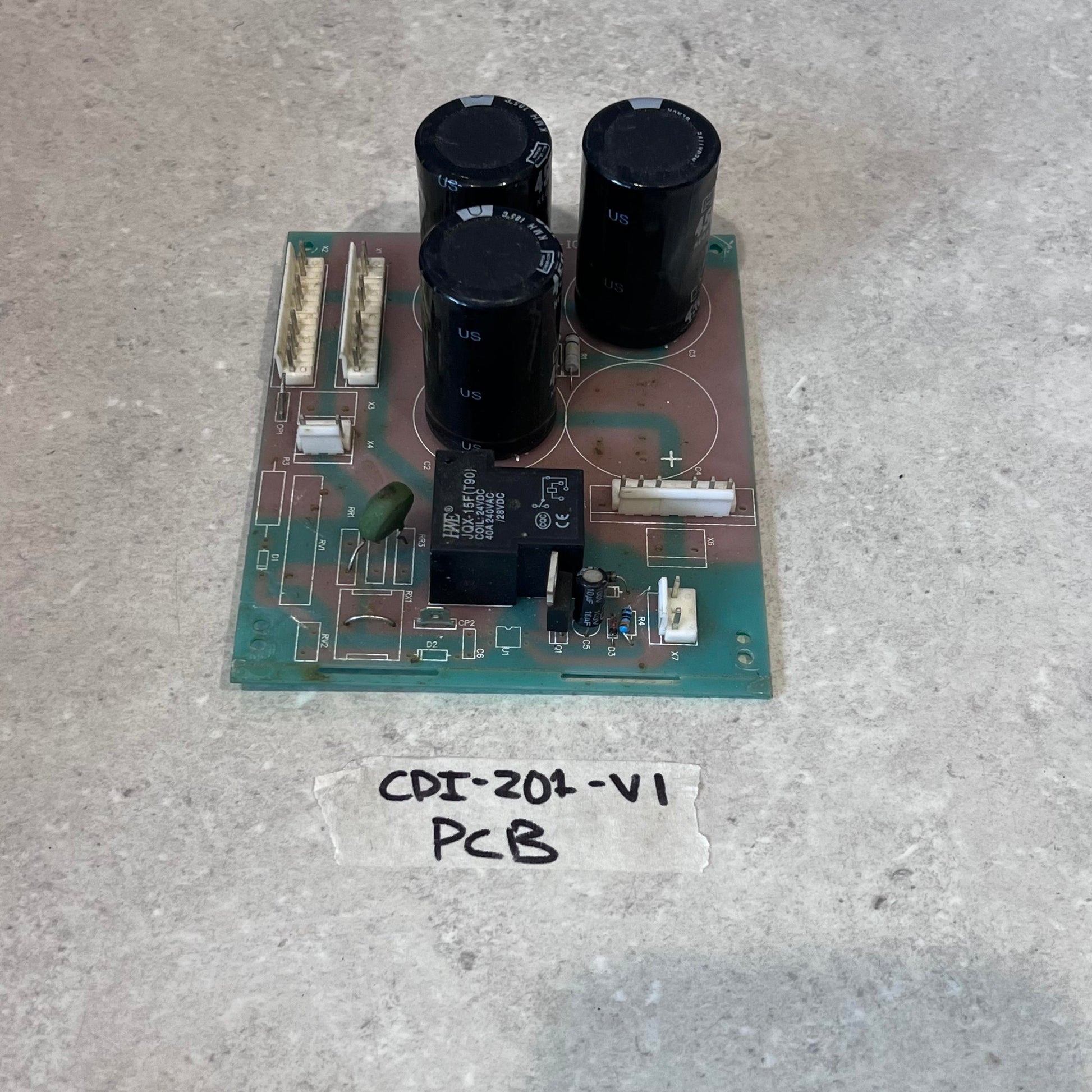 CDI-201-V1 PCB circuit board for CUT50 plasma cutter with capacitors and relays on a gray background