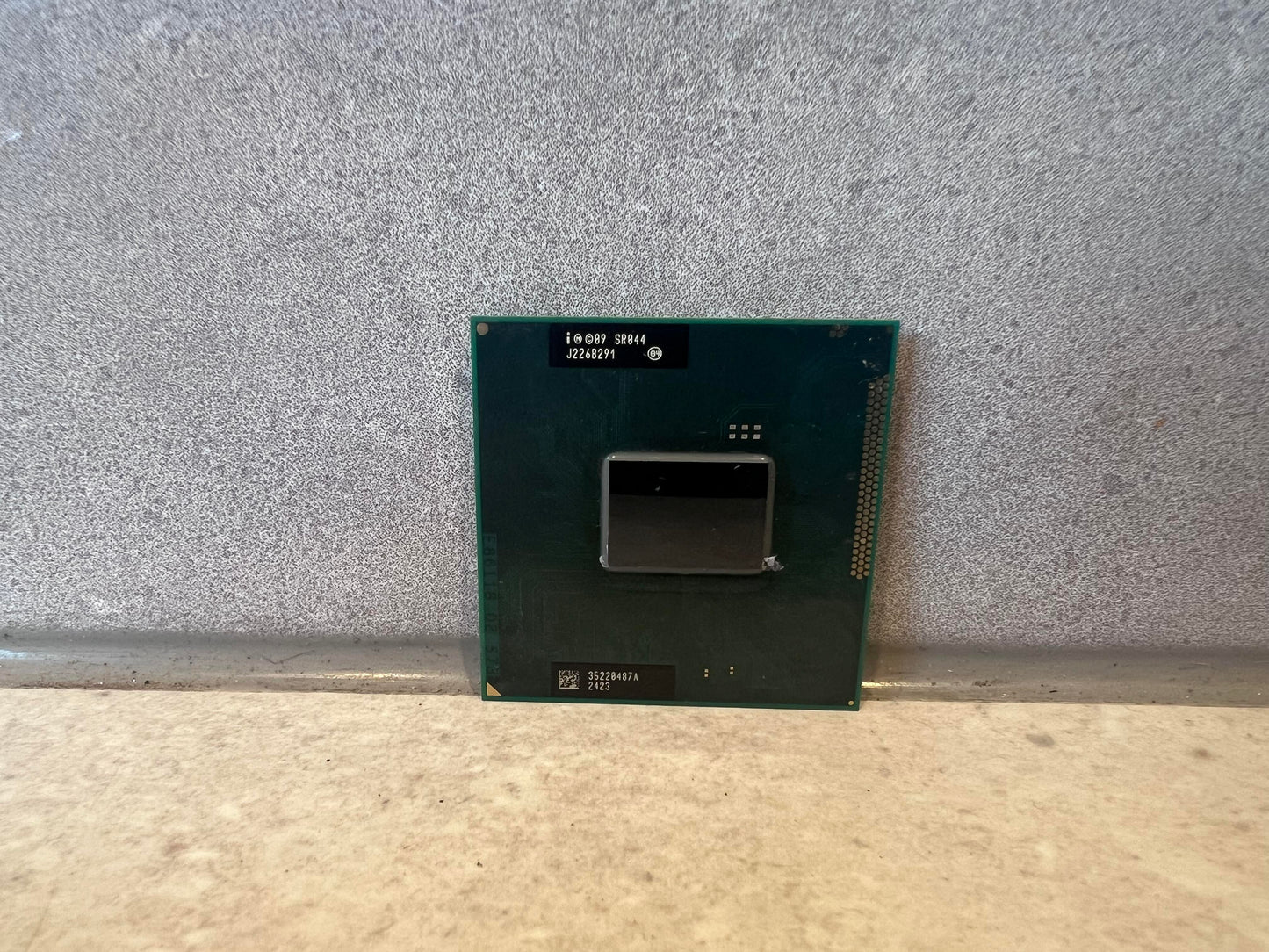 Intel CPU Processor SR044 front view showing silicon and labeling