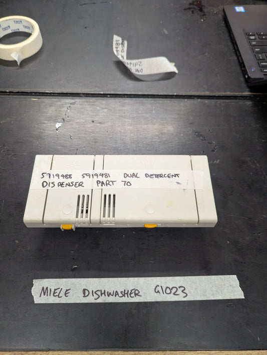 Front view of Miele G1023 dishwasher dual detergent dispenser part