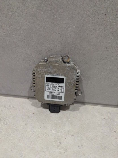 Ichikoh LED headlight control module with label and connector port visible