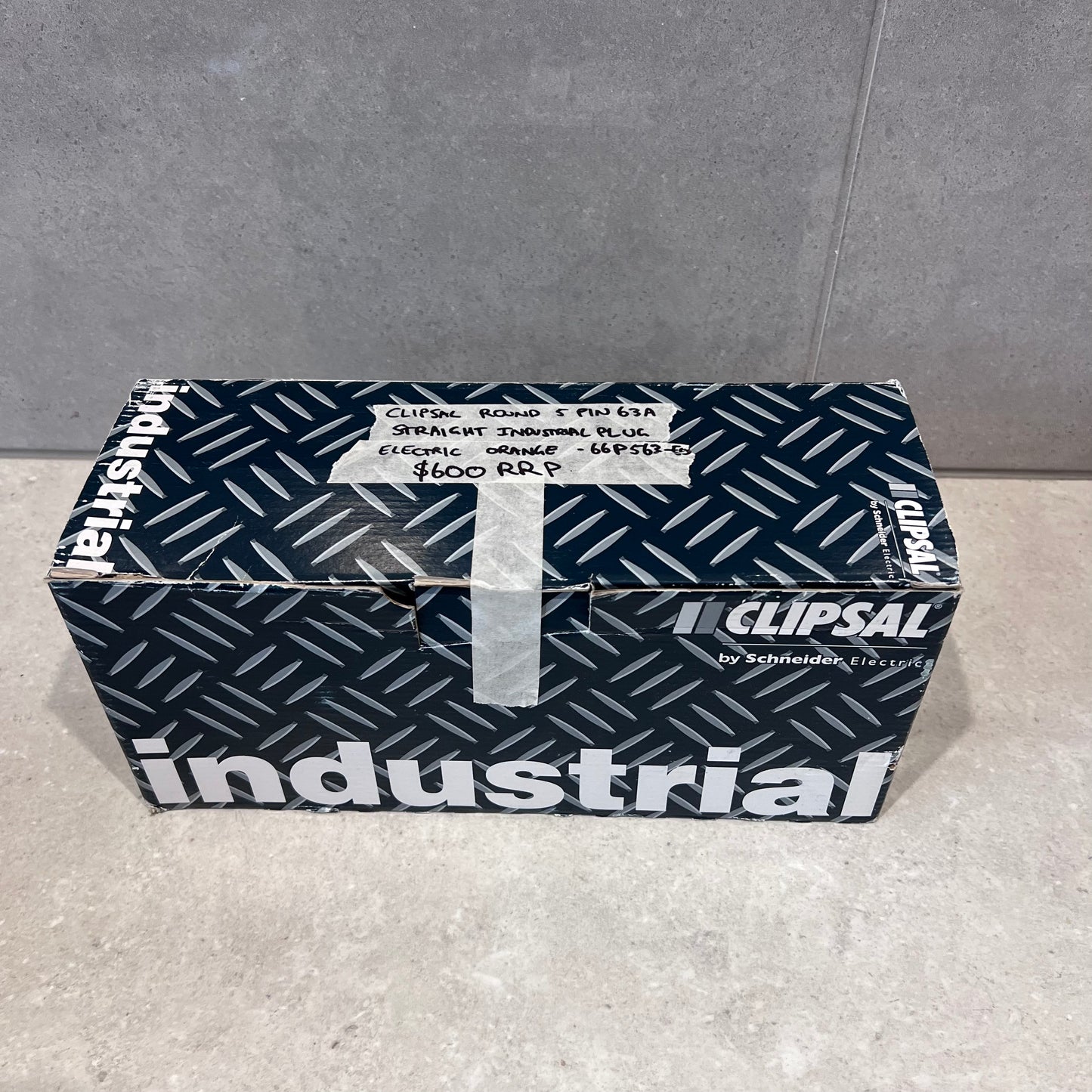 Box of Clipsal 5 pin 63A straight industrial plug by Schneider Electric