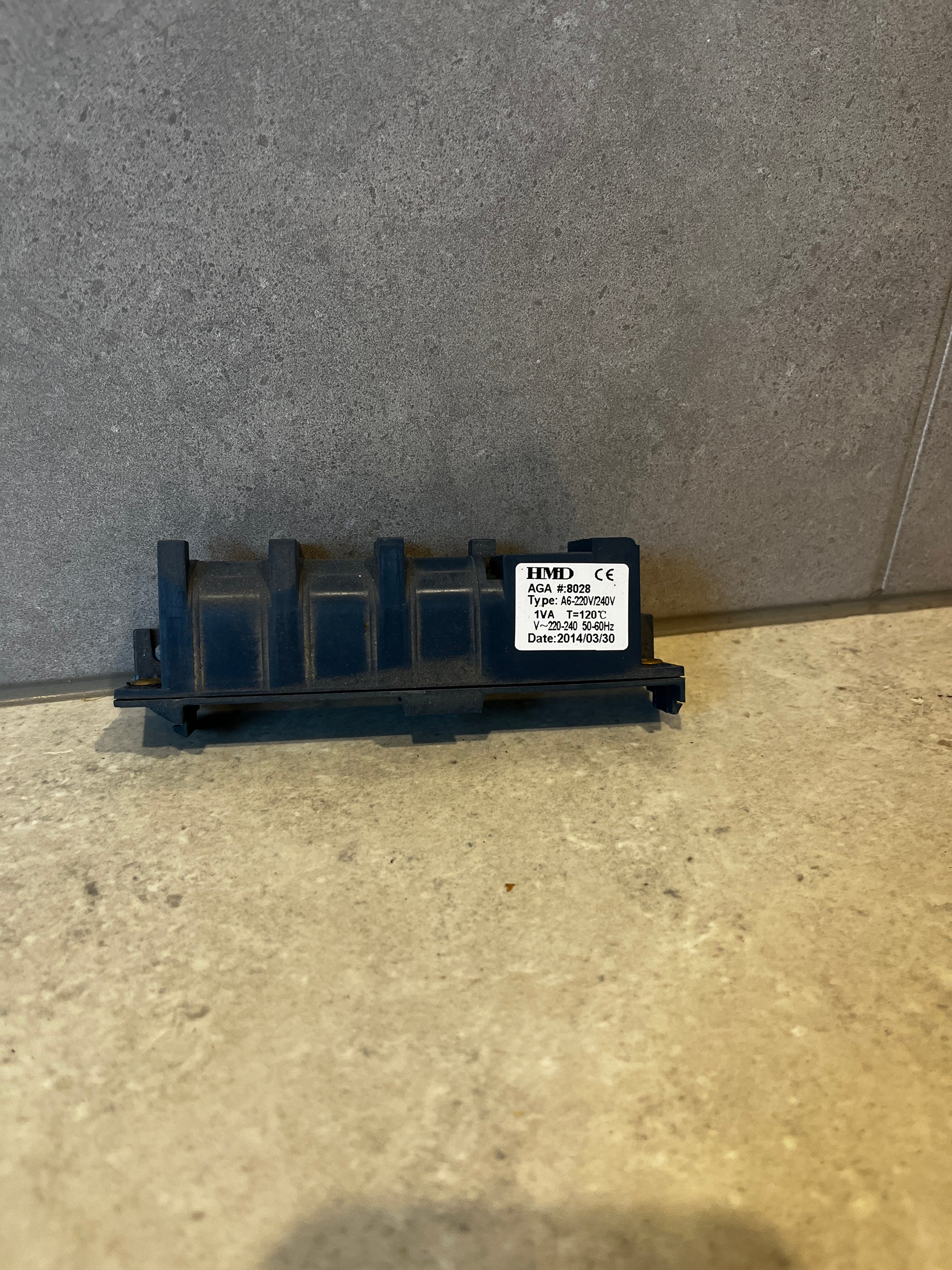 HMD Type A6 electrical component with voltage and temperature labels