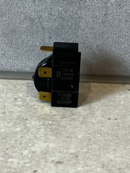 Heavy duty electrical relay switch on a stone surface