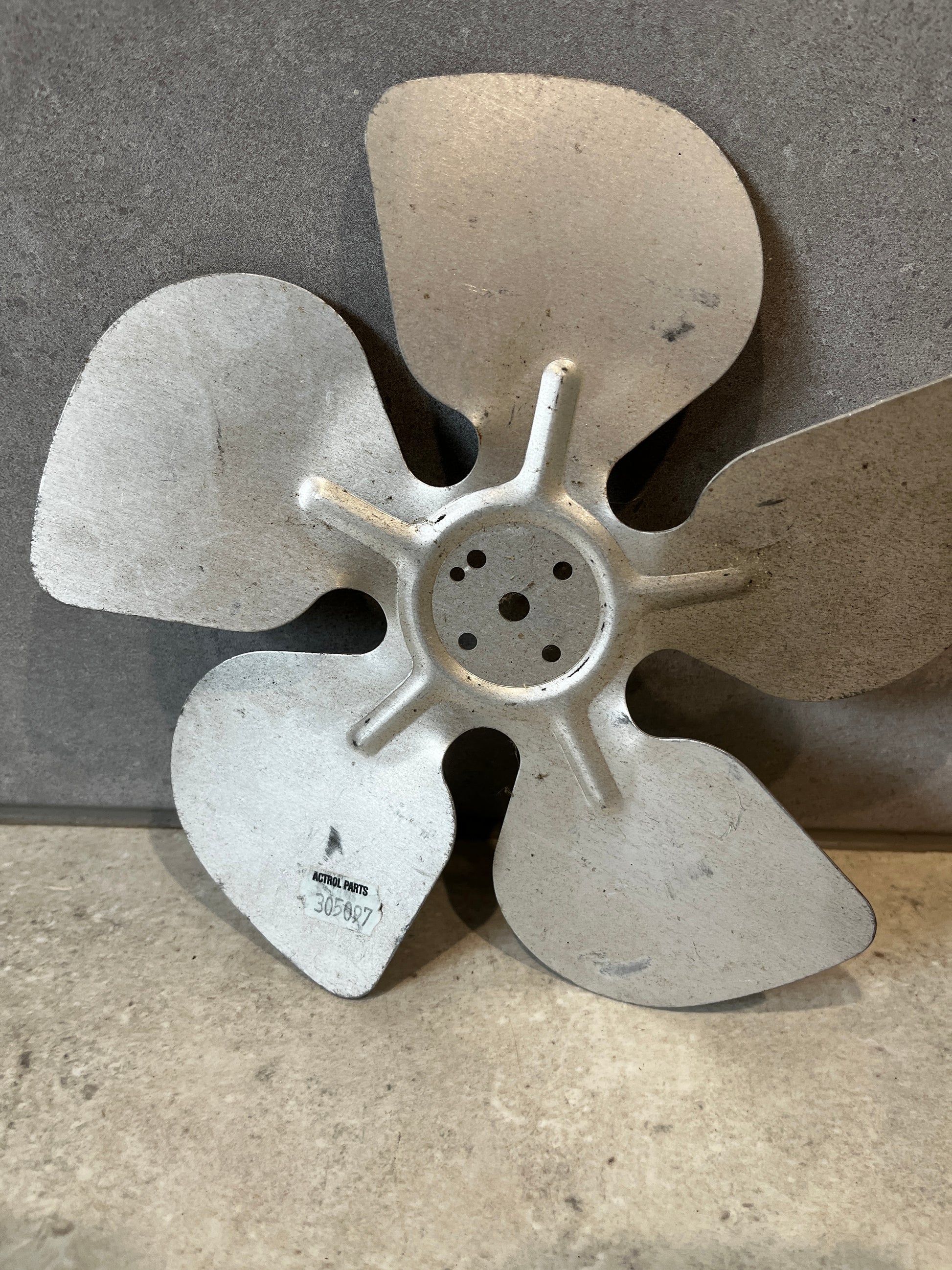 Single four-blade metal fan replacement blade