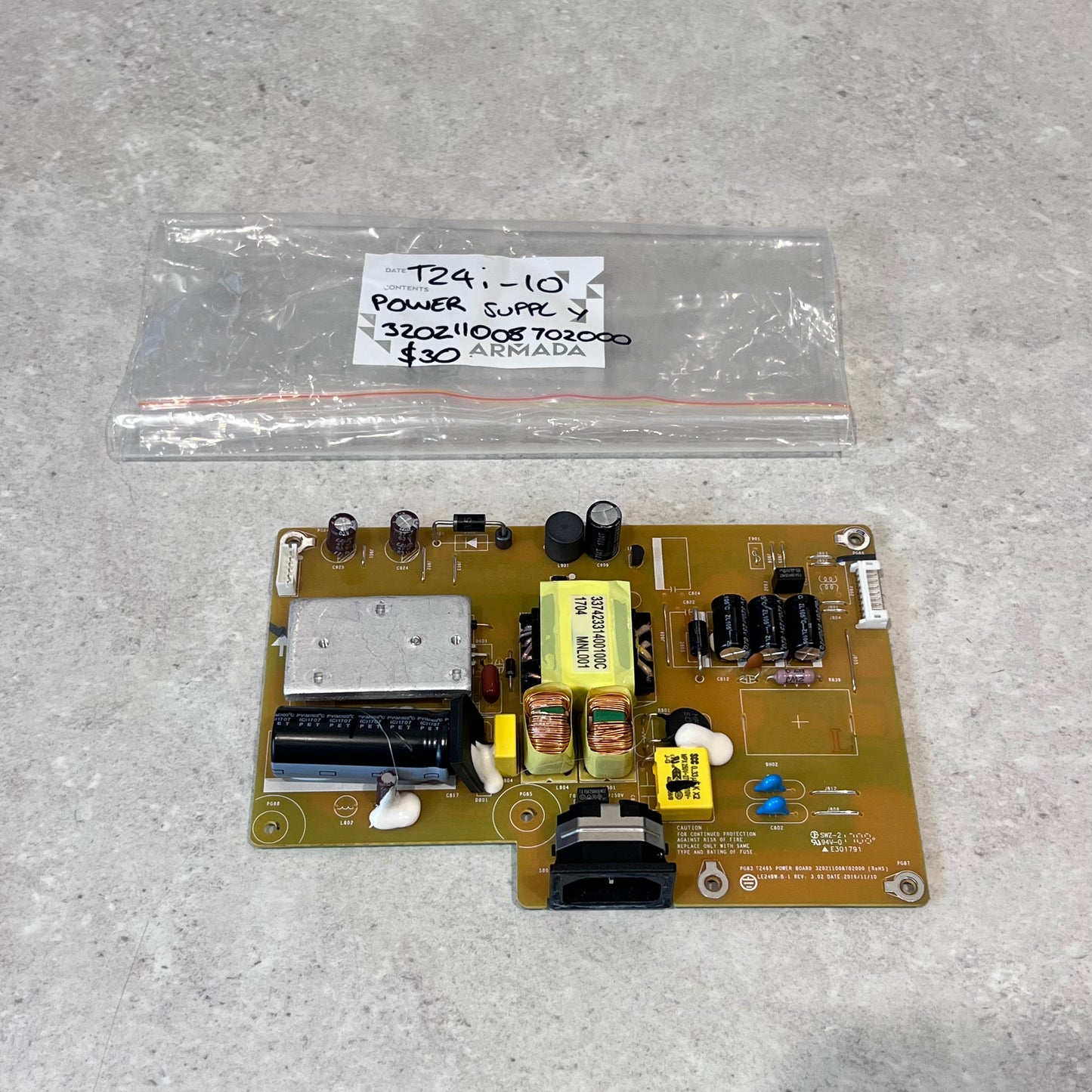 Power supply board top view with labeled components and connector ports