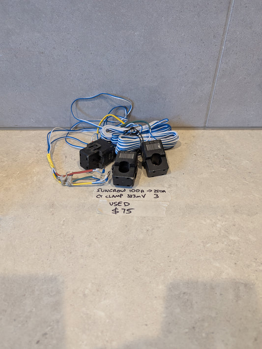 Used set of three Sungrow CT clamps with blue and white wires and handwritten price tag
