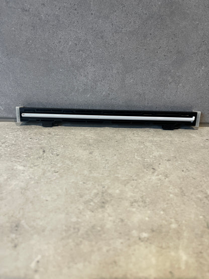 Front view of a thermal printer printhead with black plastic casing and white heating element strip