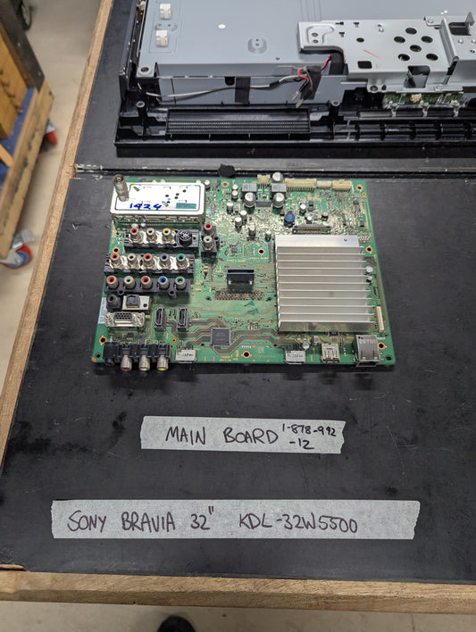 Sony Bravia 32 inch KDL-32W5500 main board with multiple AV and HDMI ports on a tech bench