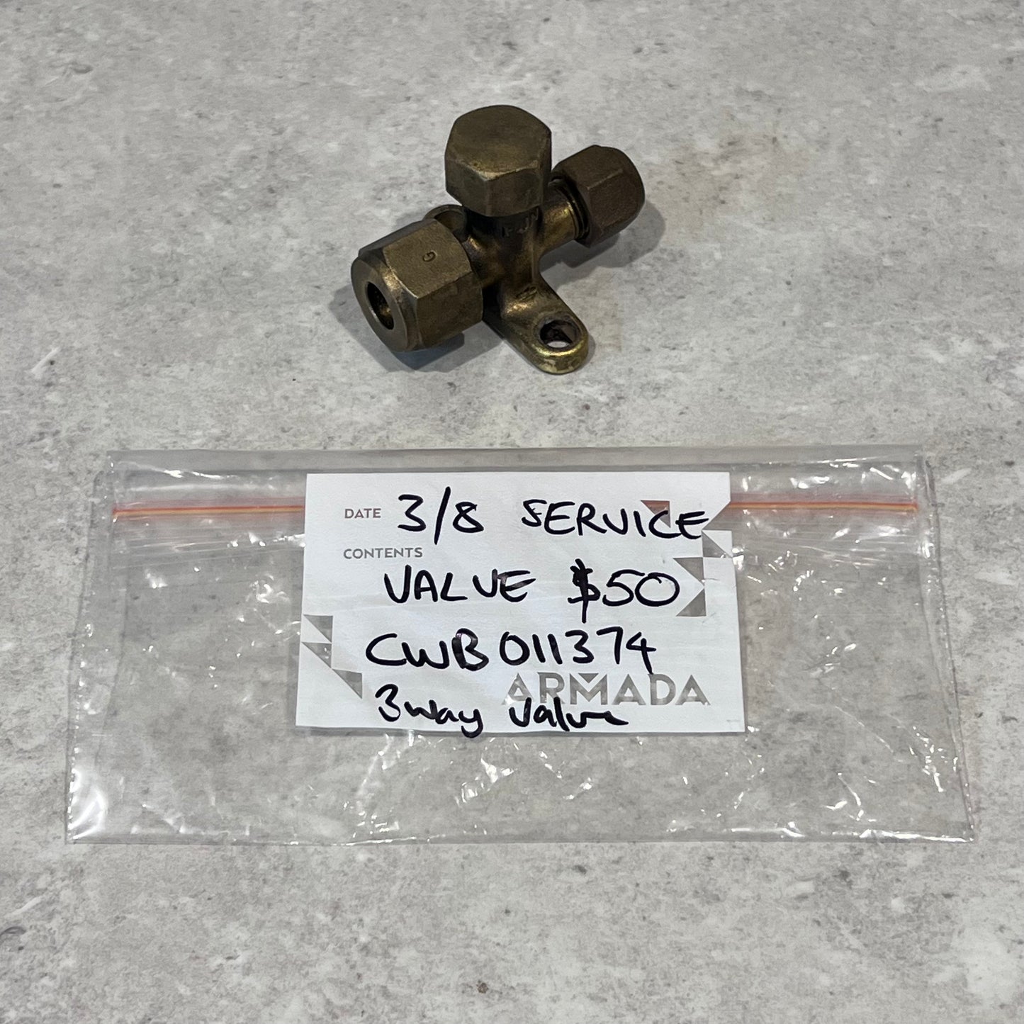 Brass 3/8 inch 3-way service valve with labeled plastic bag