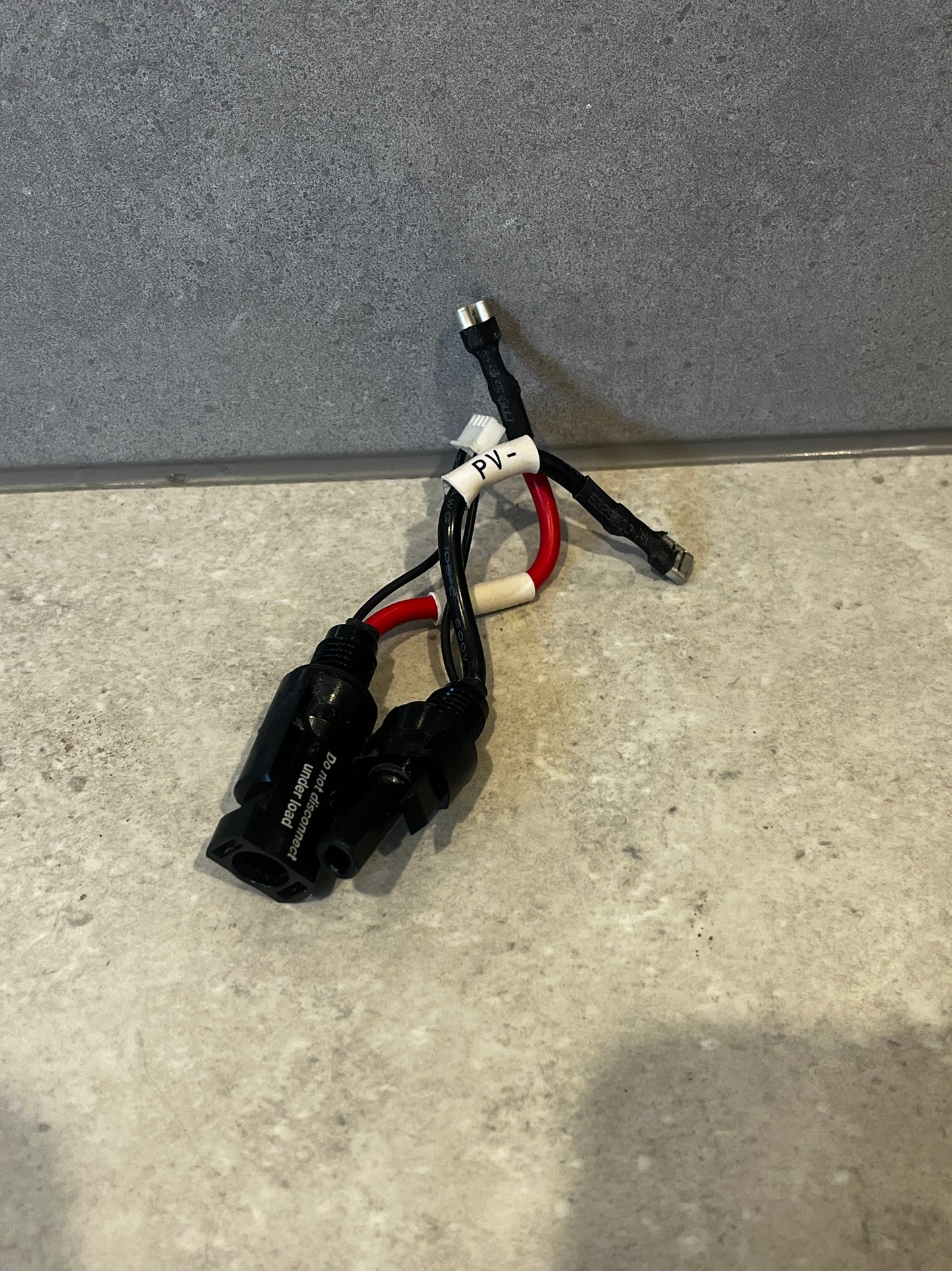 MC4 PV solar panel connector adapter with labeled wires and plug connectors
