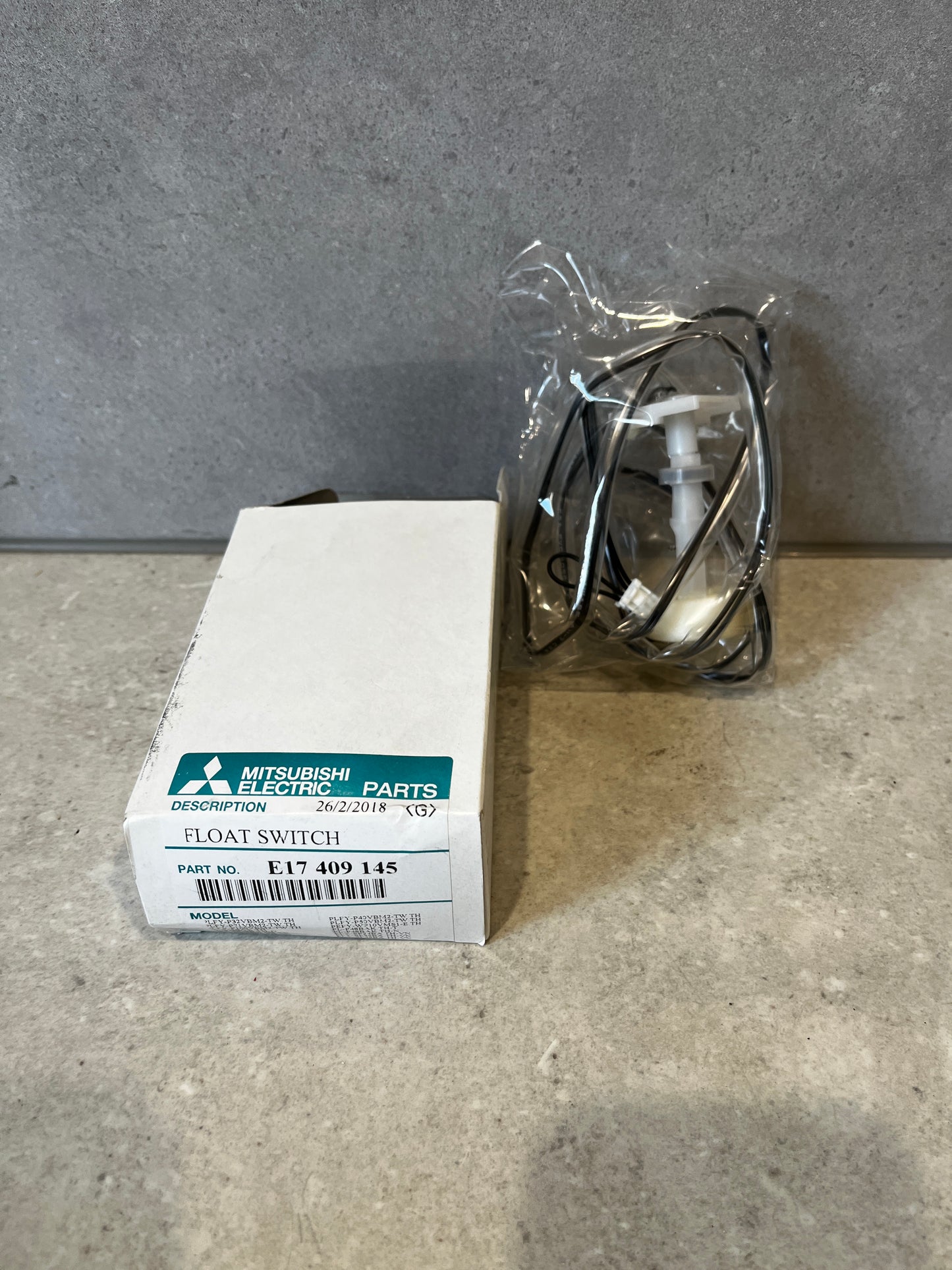 Mitsubishi Electric float switch replacement part with packaging