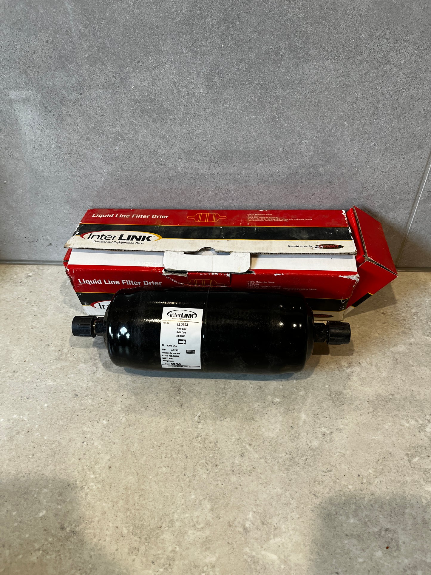 InterLINK Liquid Line Filter Drier with box on countertop