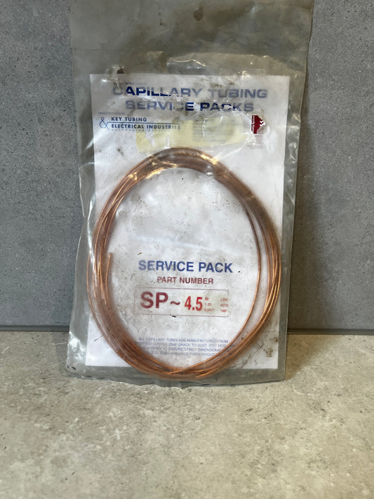 Front view of Capillary Tubing Service Pack SP-4.5 with copper coil in plastic packaging