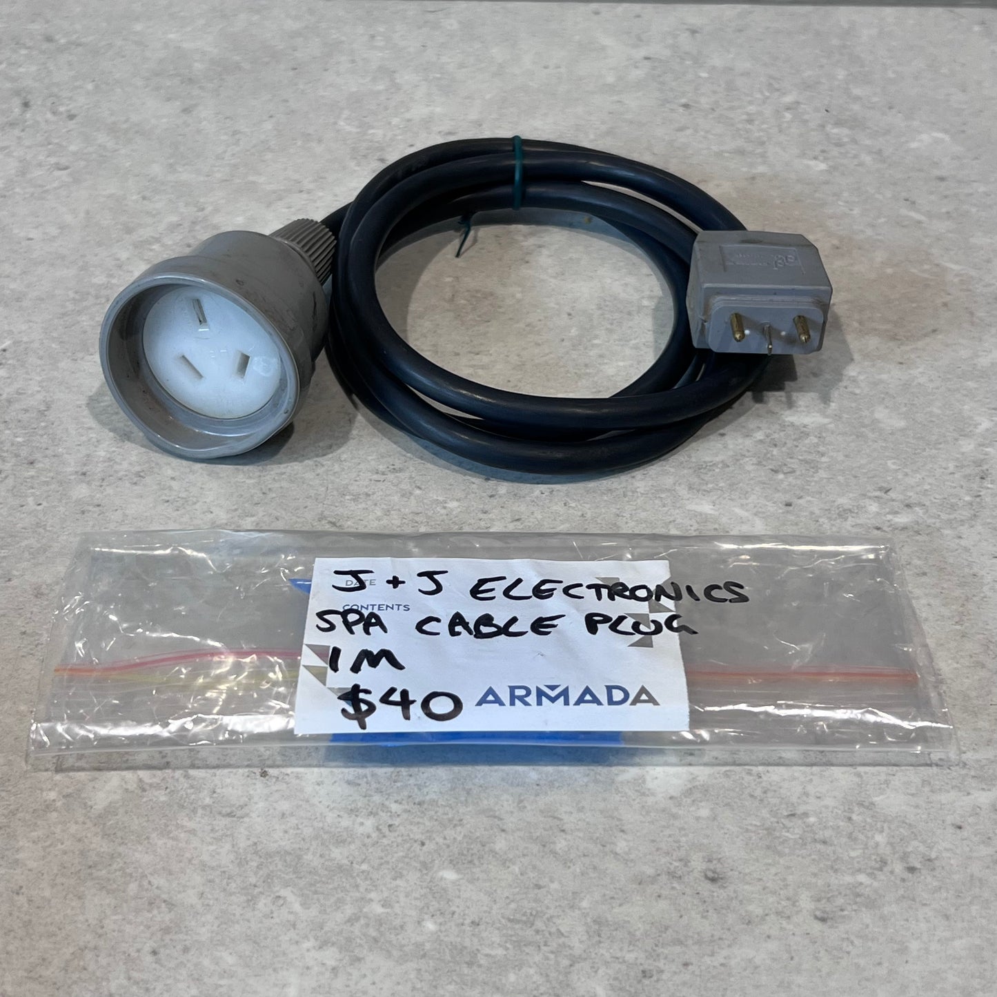 J + J Electronics 1m spa cable plug with connectors on countertop