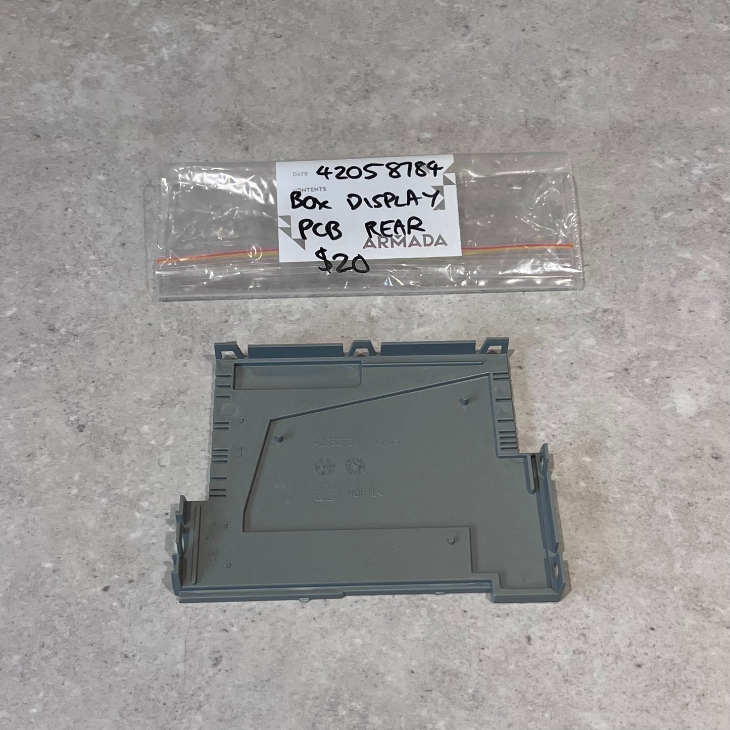 Gray plastic rear cover for display PCB with labeled packaging