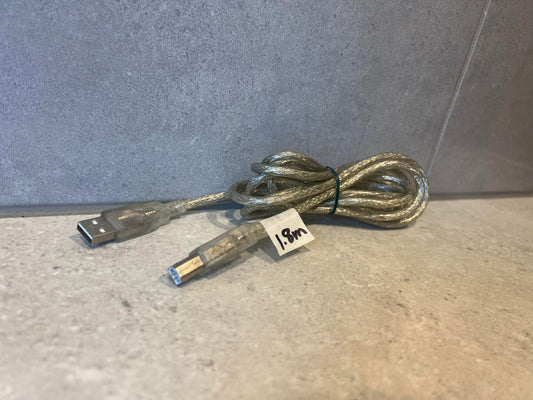 USB A to USB B cable with transparent shielding, 1.8m length, coiled on a neutral background