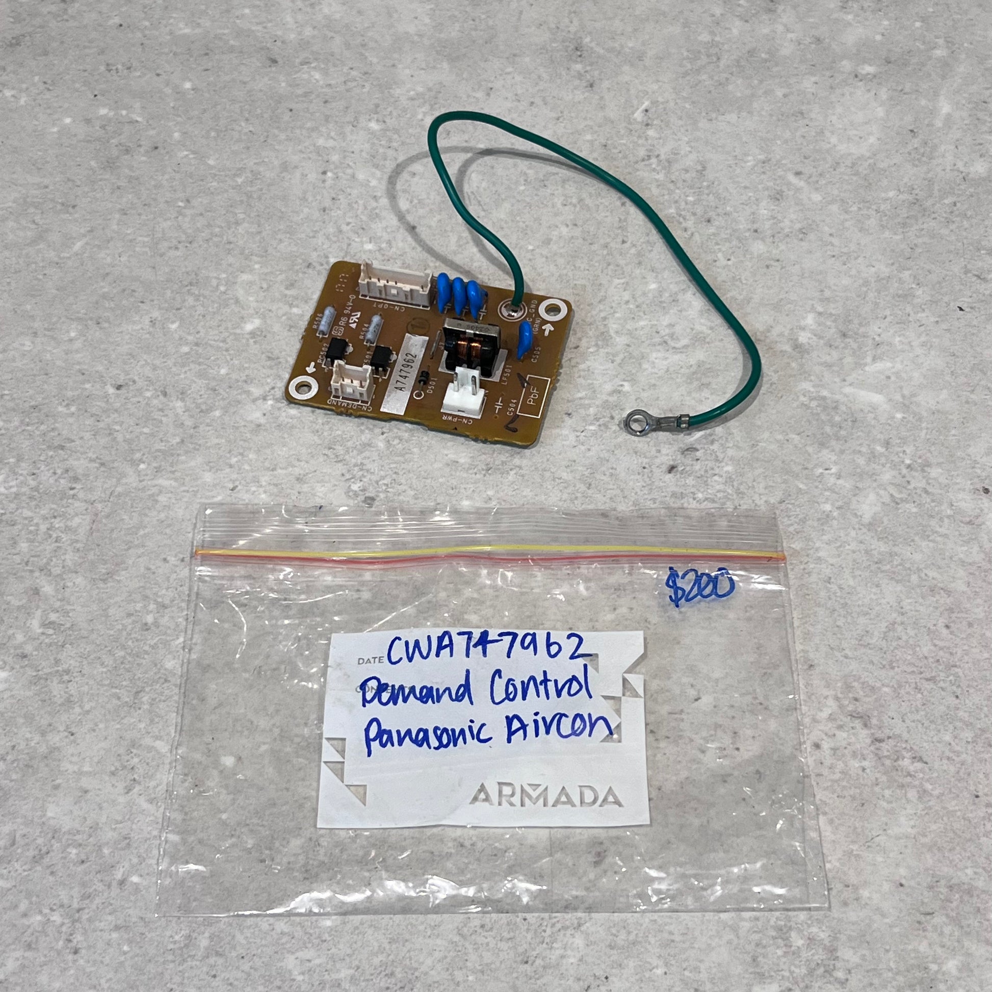 Panasonic Aircon Demand Control Module CWA747962 with green wire and labeled bag
