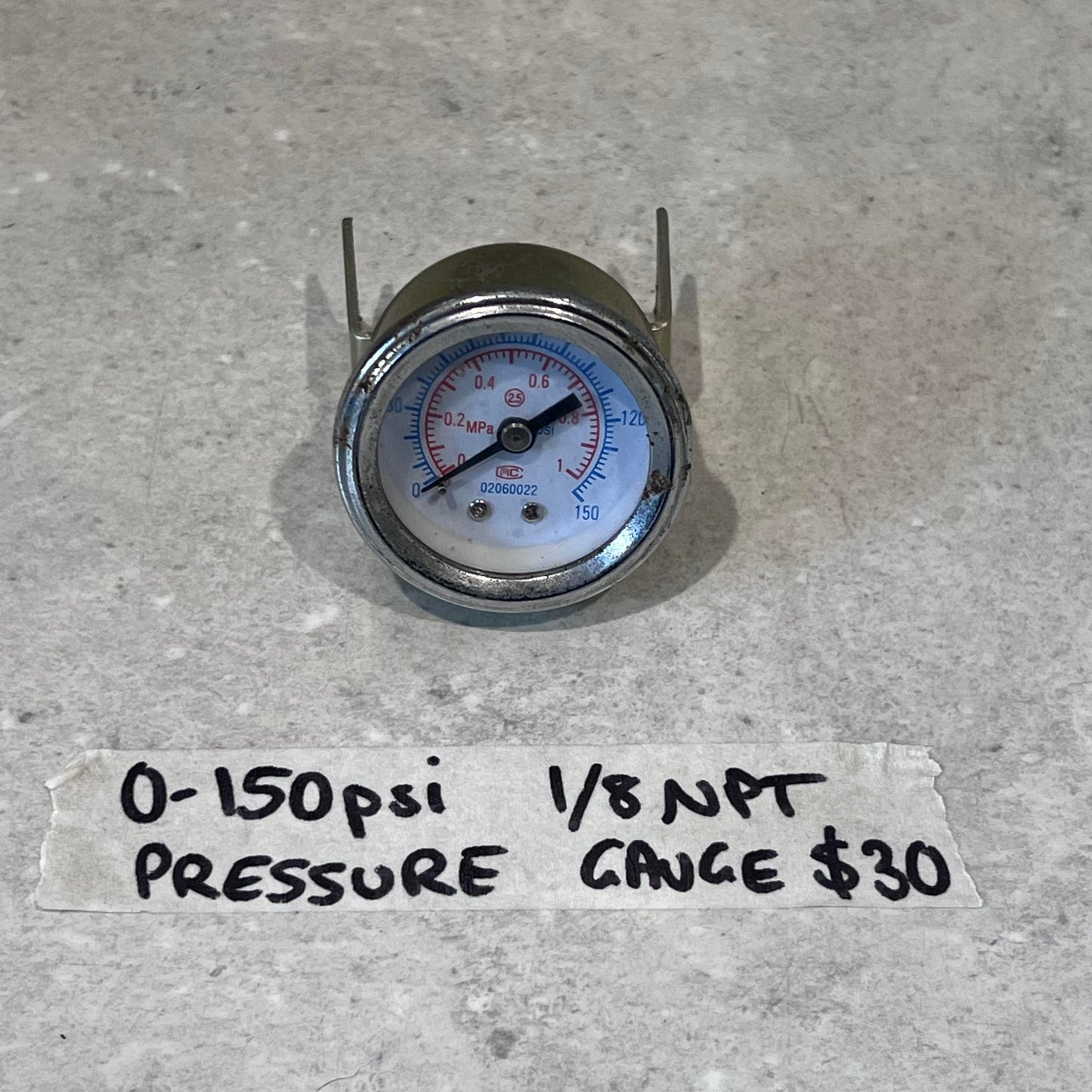 0-150 psi pressure gauge with 1/8 NPT fitting for CUT50 plasma cutter, gauge displayed on gray surface with information label